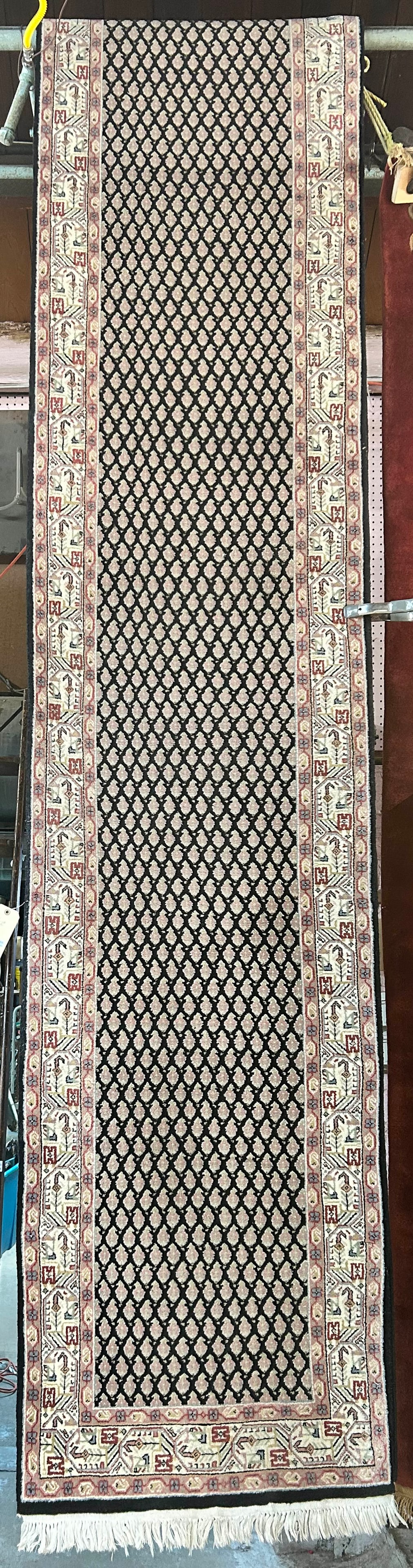 2' 6" x 21' 8" Sarough Mir Pattern Runner Rug.: It may be of Indian make (please see photos for weave details). The rug has seen use, but is in good overall condition. In-house shipping is available for this rug. Please see our website regarding