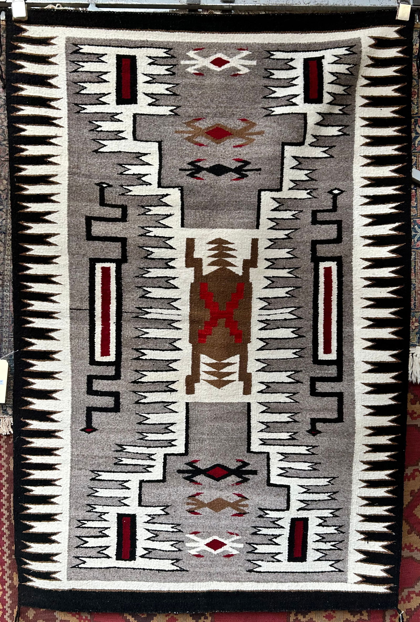 3' 8" x 5' 6" Navajo Eye Dazzler Rug.: This rug looks to be on the newer side, and is in very good condition. In-house shipping is available for this rug. Please see our website regarding our in-house shipping procedures.