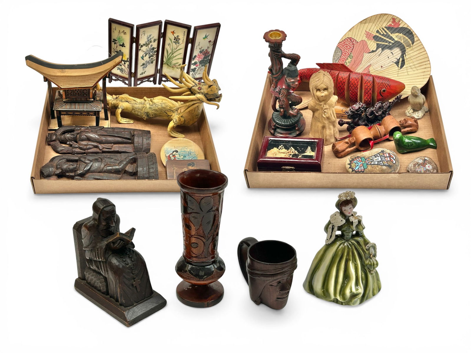 Lot of Asst. Decor- Asian, Inuit, American Indian.: This lot includes carved figurines and sculptures, a face mug, a vase, a figural bookend, a monkey candlestick, and more. Some items are in better shape than others; overall, the lot looks to be in