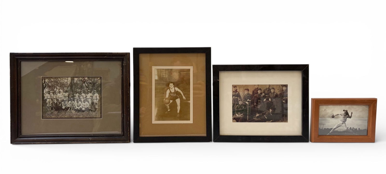Lot of Black & White Framed Photos, Mostly Sports.: The two pictures with female subjects are digital prints. The other two pictures look to be darkroom prints, featuring a solo Ball State basketball player and an entire vintage baseball team known as