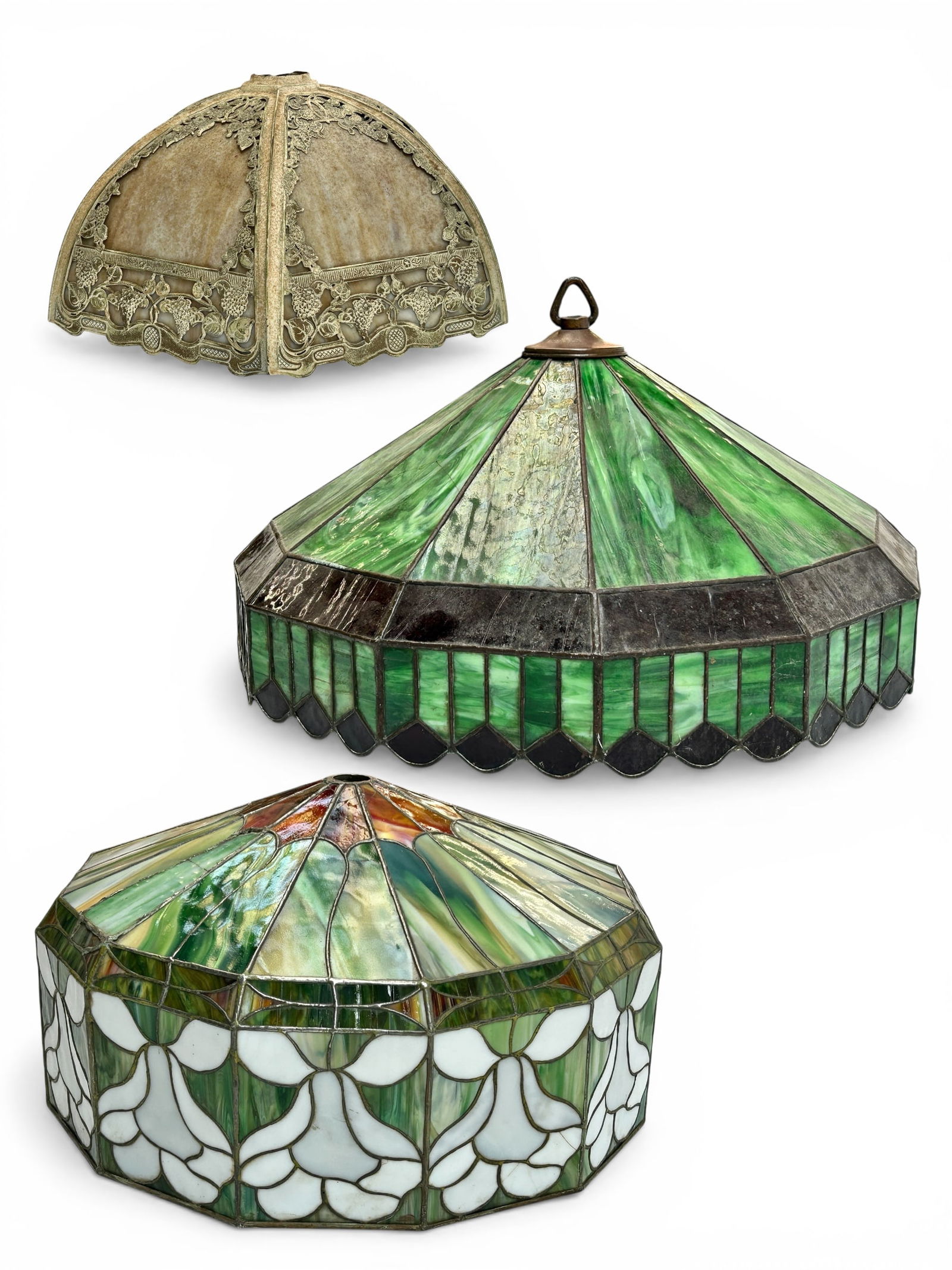 Lot of 3 Slag Glass Lamp Shades.: The two larger shades are suitable to be used as ceiling fixtures. The shade with the white flowers has several cracks. The green slag glass shade also has some cracks, but not as many. The smaller