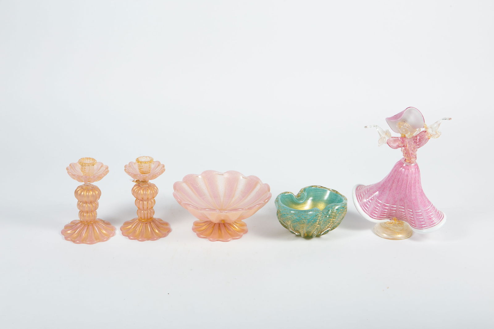 Lot: 5 Pcs. of Possibly Murano Art Glass.: There are no signatures or manufacturer's stickers present. All five pieces have a shimmery gold accents. Most of the items are pink; one other is teal or aqua. The lot includes a pair of footed