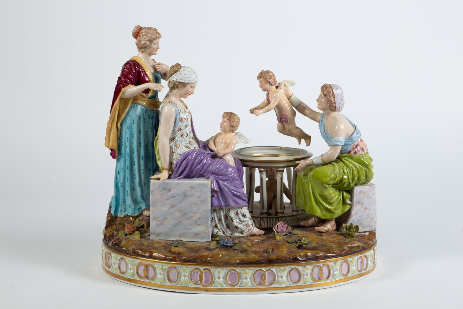 Lg. Carl Thieme Figural Group- Women & Cherubs.: There are some cosmetic flaws to this 19th/20th Century German porcelain Dresden piece, but overall, it presents well. There are some chipped leaves and flower petals, and one of the women has a chipp