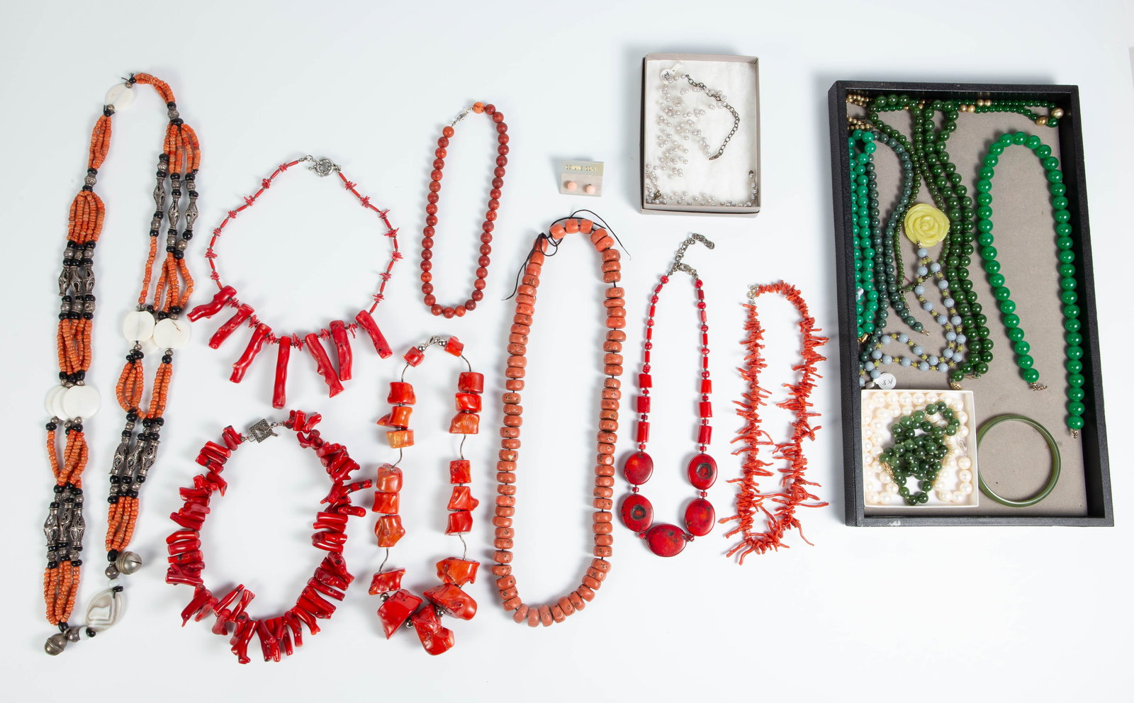 Mostly Coral & Jade Jewelry Inc. 14K Gold Clasps.: The lot contains 21 items. There are necklaces, bracelets, and a pair of earrings. The lot also includes a pearl necklace and bracelet set. A few necklaces have sterling silver clasps. The necklaces w