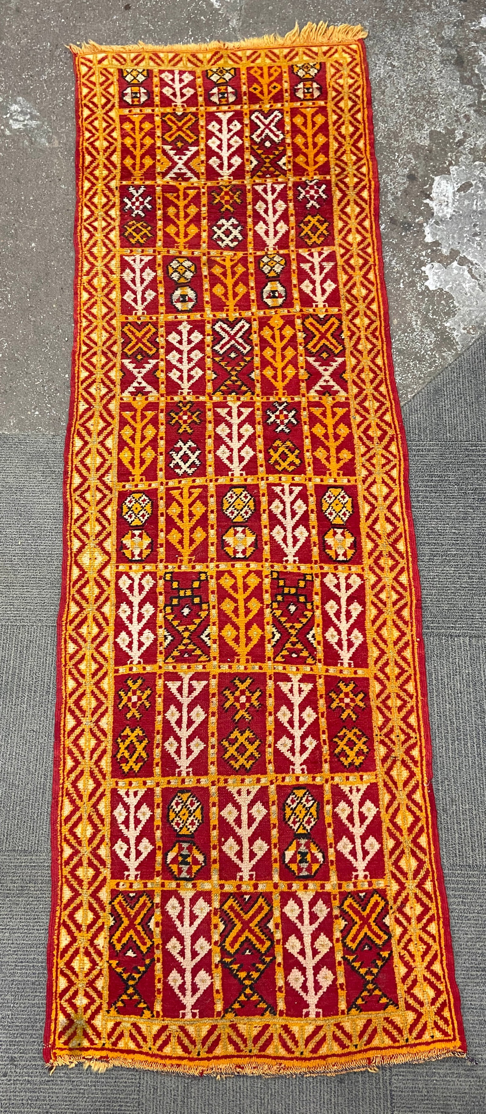 2' 6" x 8' Moroccan Runner Rug.: The rug has a discoloration spot in one corner. Otherwise, it is in good overall condition. In-house shipping is available for this rug. Please see our website regarding our in-house shipping procedur