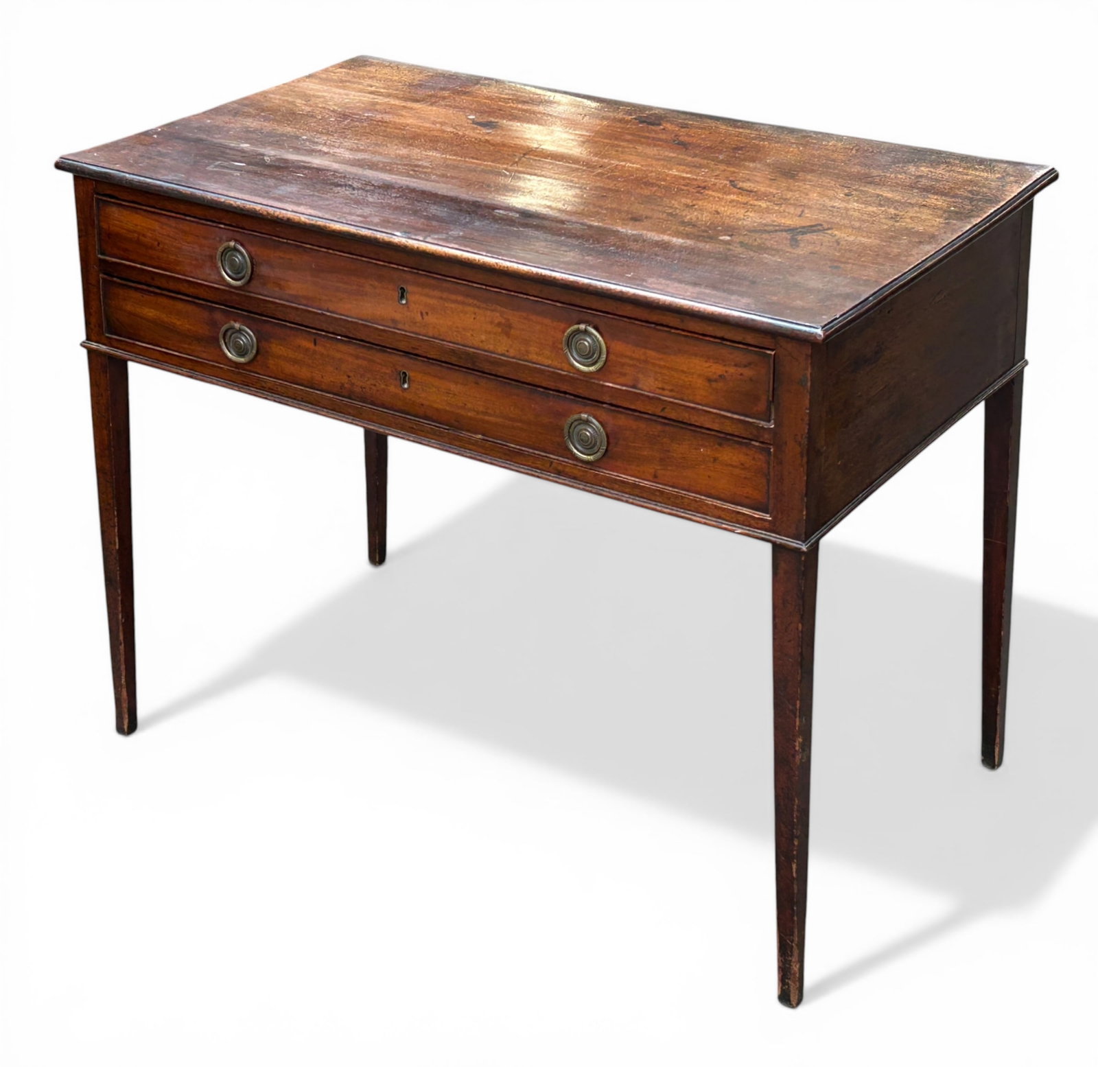 Antique Georgian Style Reading Table.: This mahogany ? reading or side table has two drawers with brass pulls and keyholes (no keys are included). The piece has a nice worn patina, and is in solid condition. It measures 39 1/2" wide, 23"