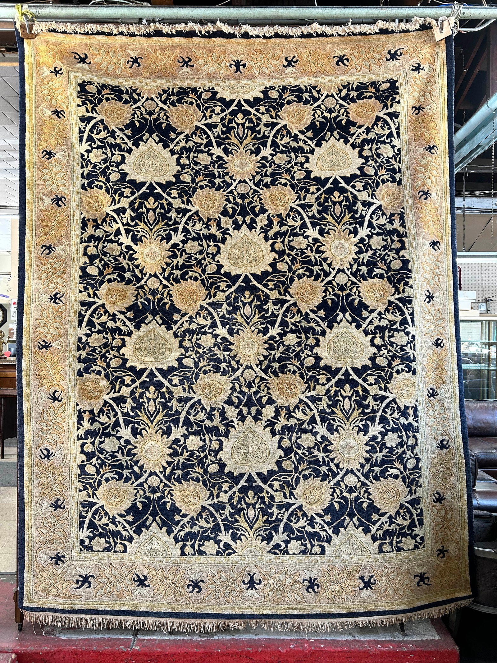 8' x 10' 2" Gold & Black Sculptured Rug.: The rug looks to be in good overall condition. In-House Shipping is available for this rug. Please see our website for our in-house shipping procedures.