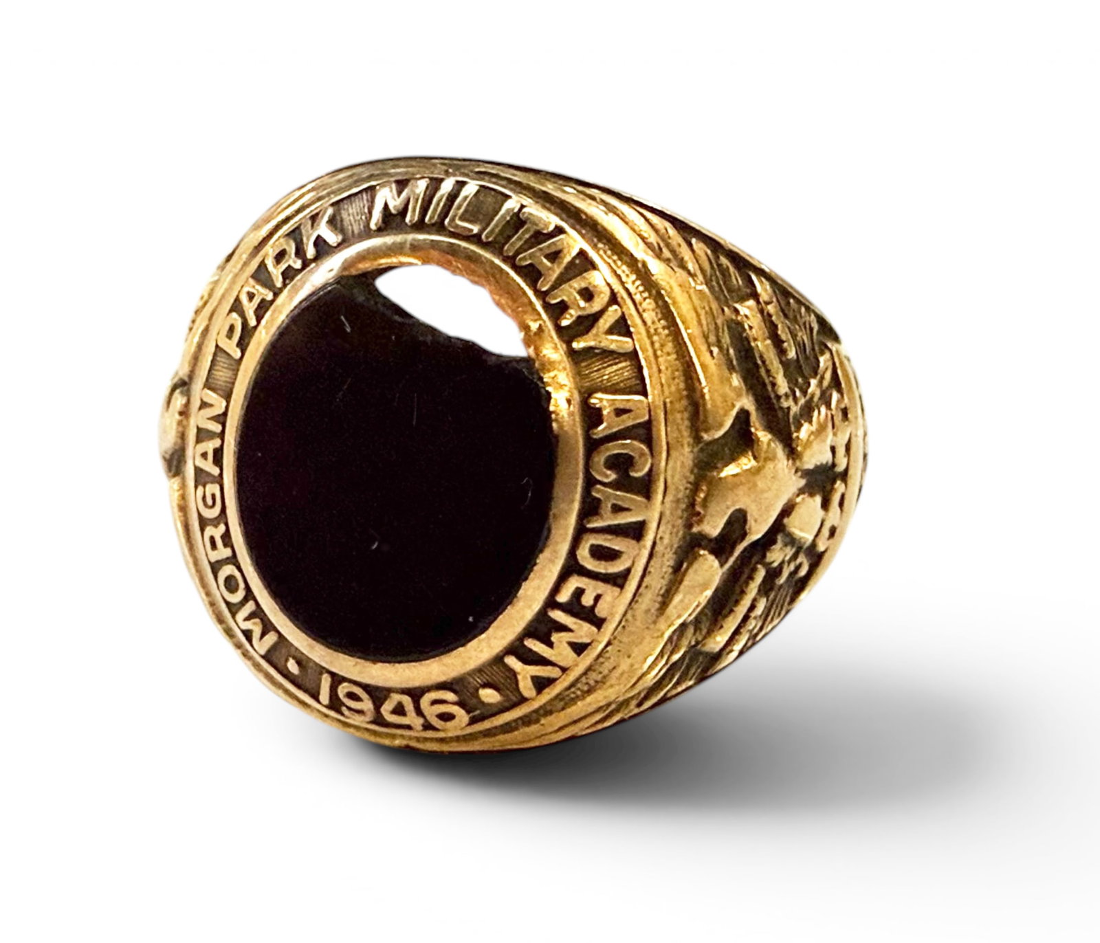 10K Gold & Onyx Morgan Park Military Academy Ring: The ring is marked Pat Four 10K inside the band, along with a star icon and a personal inscription. The ring has an oval black onyx stone, which is chipped. The stone is surrounded by the inscription,