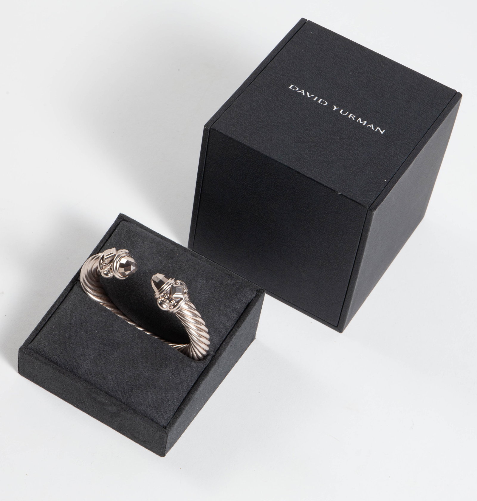 David Yurman Renaissance Aluminum Cuff Bracelet.: The chunky bracelet is marked David Yurman Aluminum. It is composed of a 10mm wide cable and two chunky geometric ends. The piece measures 2 3/16" across the inside. It comes with the original box, wh
