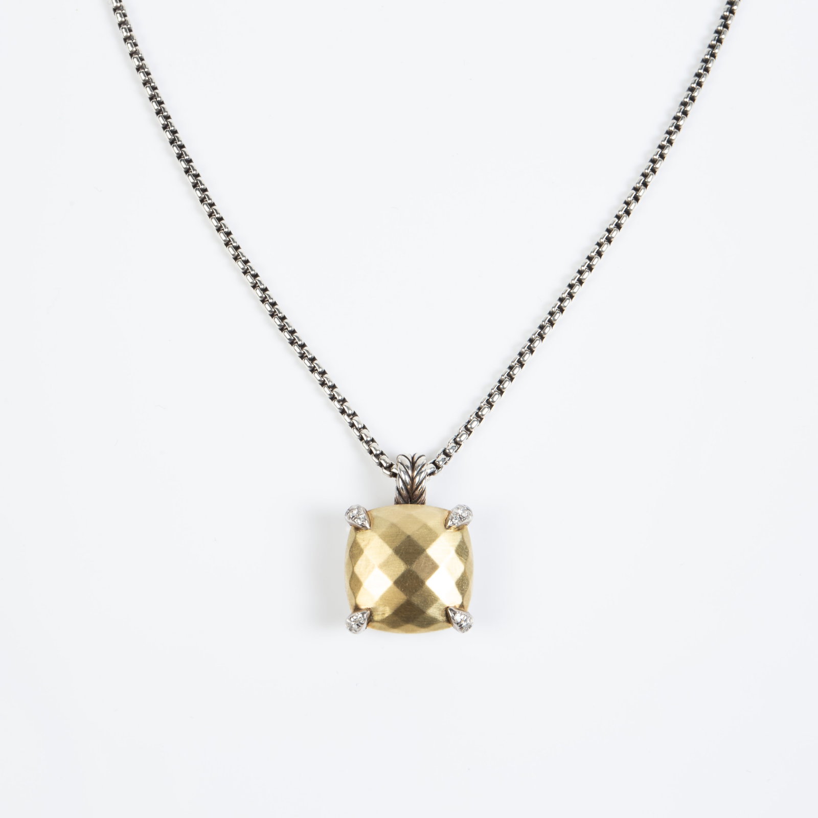 David Yurman Sterling, 18K Gold & Diamond Necklace: The Chatelaine sterling and 18K gold necklace has a sterling silver chain, and a pendant composed of sterling silver, 18K yellow gold, and small round brilliant cut diamonds. The chain is marked 925 D