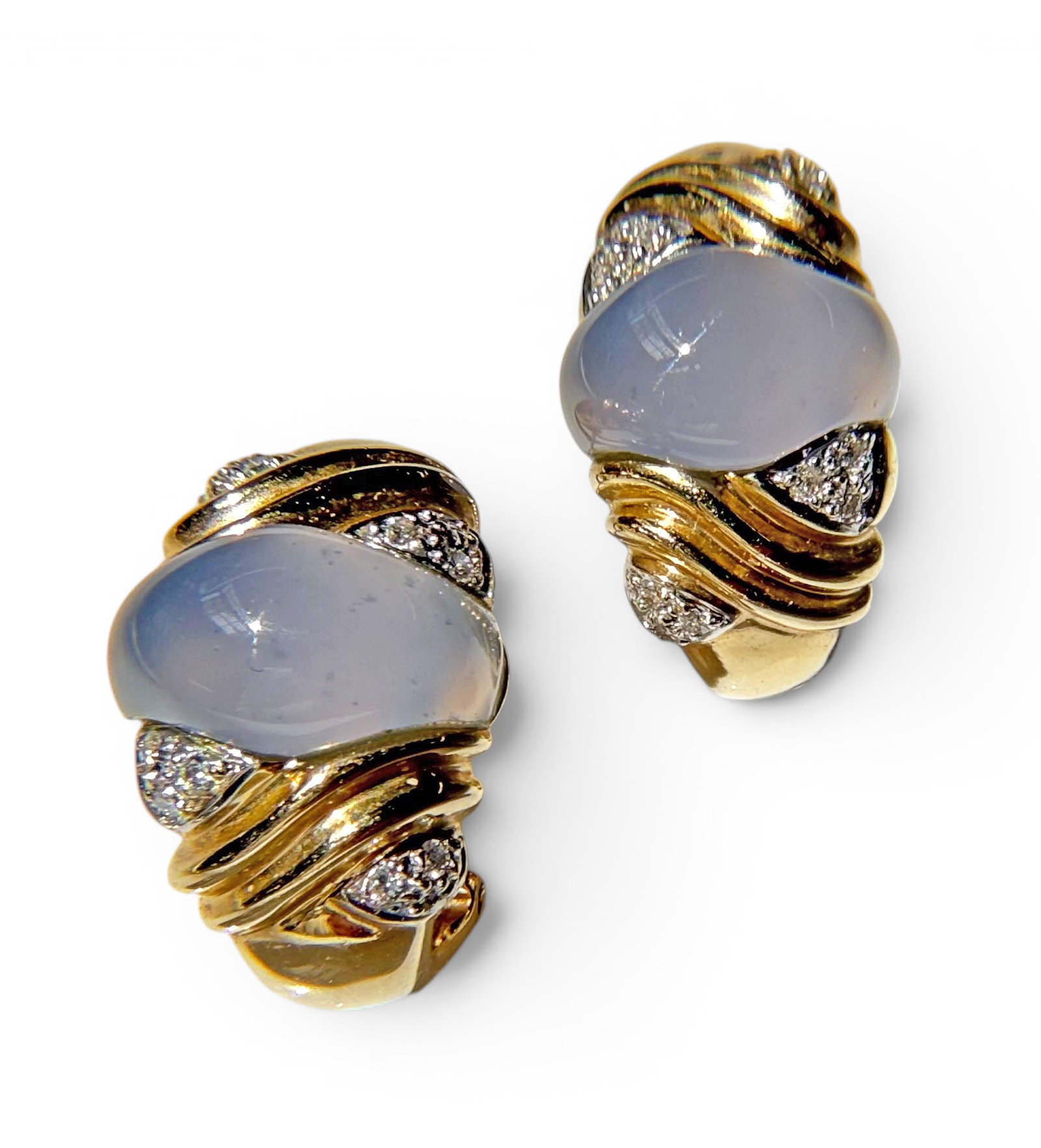 14K Gold, Chalcedony & Diamond Earrings.: The pair of earrings feature a chalcedony cabochon stone and small round brilliant diamonds. The diamonds measure 1mm in diameter, and the earrings measure 20mm long and 11 1/2mm wide. They are marked