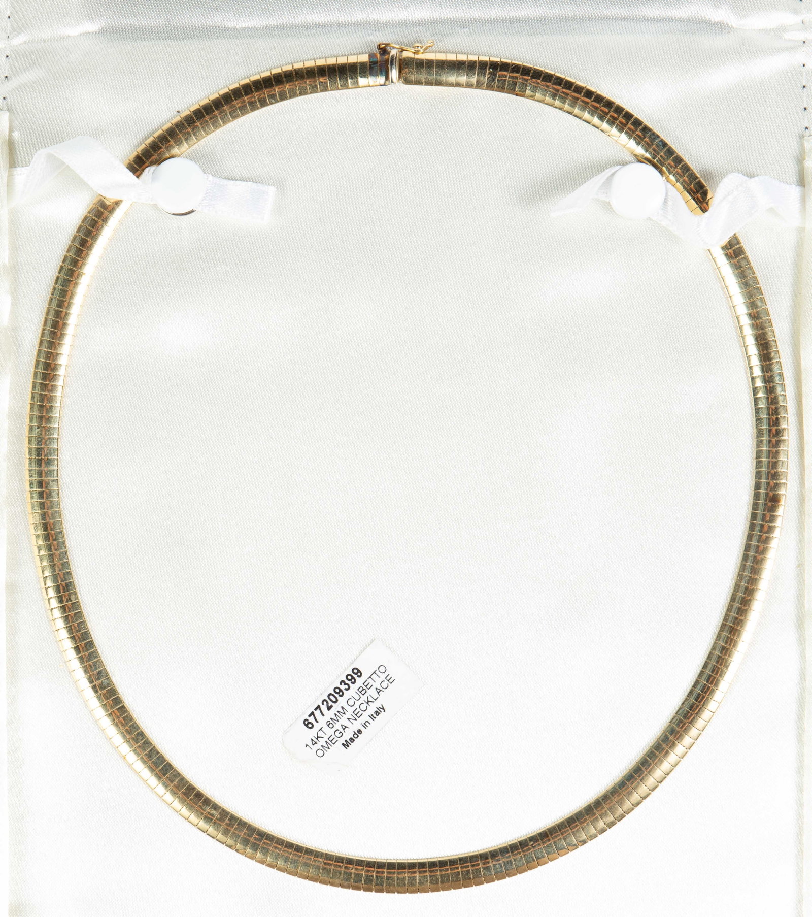 Italian 14K Yellow Gold Omega Chain Necklace.: The Cubetto Omega chain is marked 14Kt Italy on the clasp. It measures 17" long and 6mm wide. It weighs 17.6 Pennyweight, or 27.4 Grams. It comes with a black case. There is some tarnish and scratches
