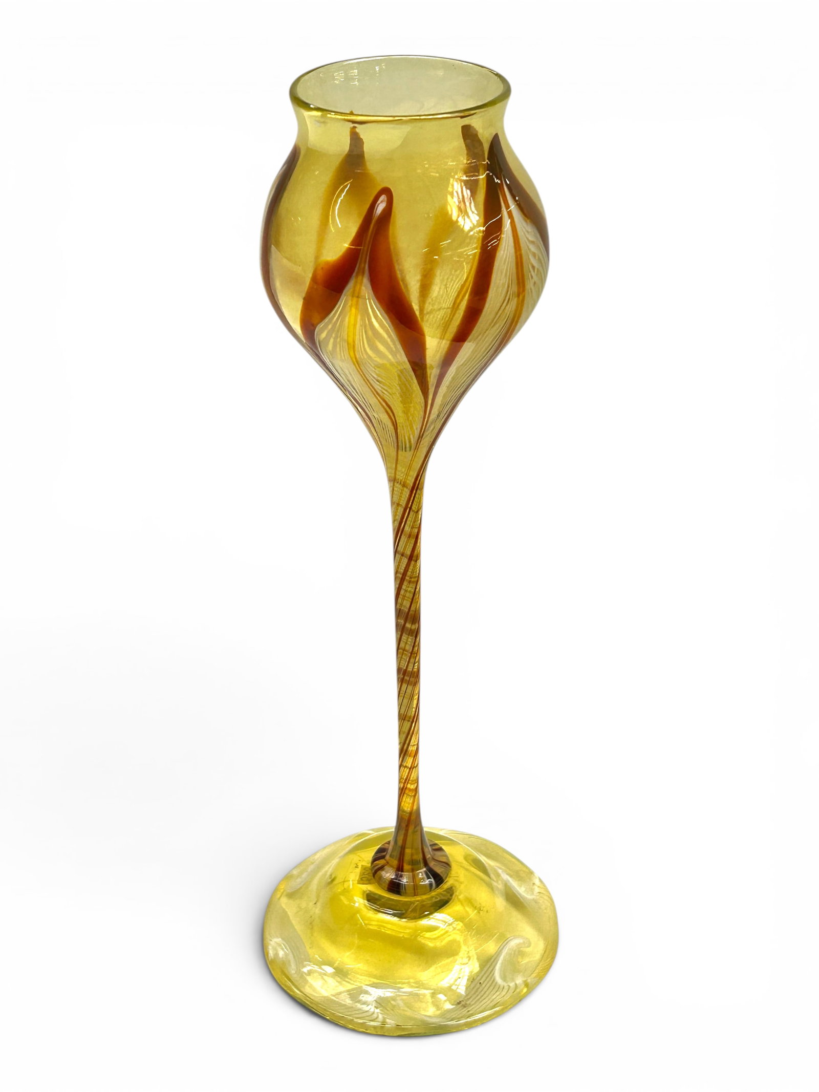 Tiffany Studios Pulled Feather Floriform Vase.: The floriform vase is signed L.C.T. on the underside. It features pulled feather decorations against transparent yellow Favrille glass, a long stem with brown and white swirls, and a foot with white