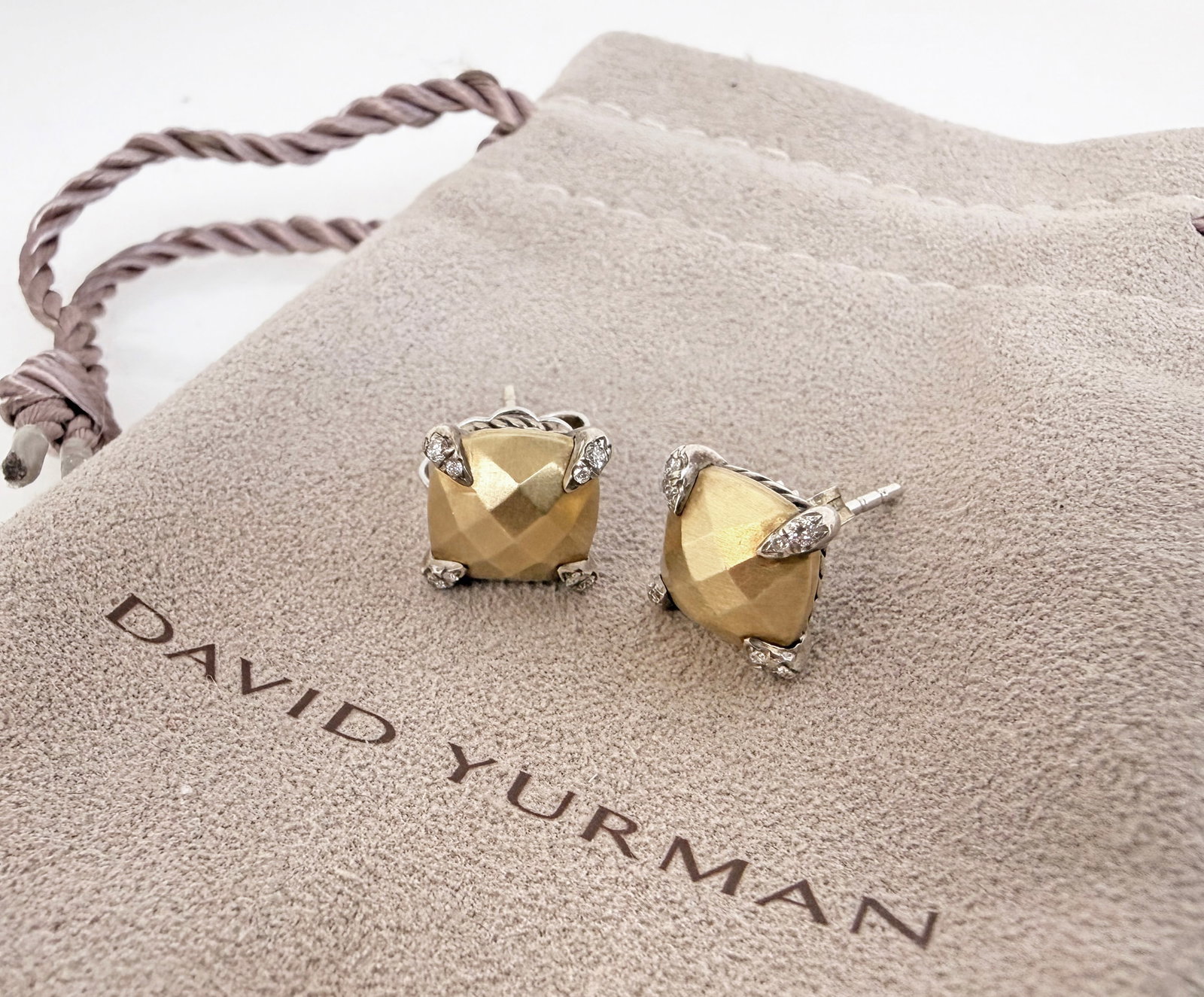 David Yurman 925, 18K, Diamond Albion Earrings.: The pair of Albion stud earrings are composed of a sterling silver setting, an 18K yellow gold multifaceted cushion style section, and small brilliant diamonds on the prongs. They are marked D.Y. / 92