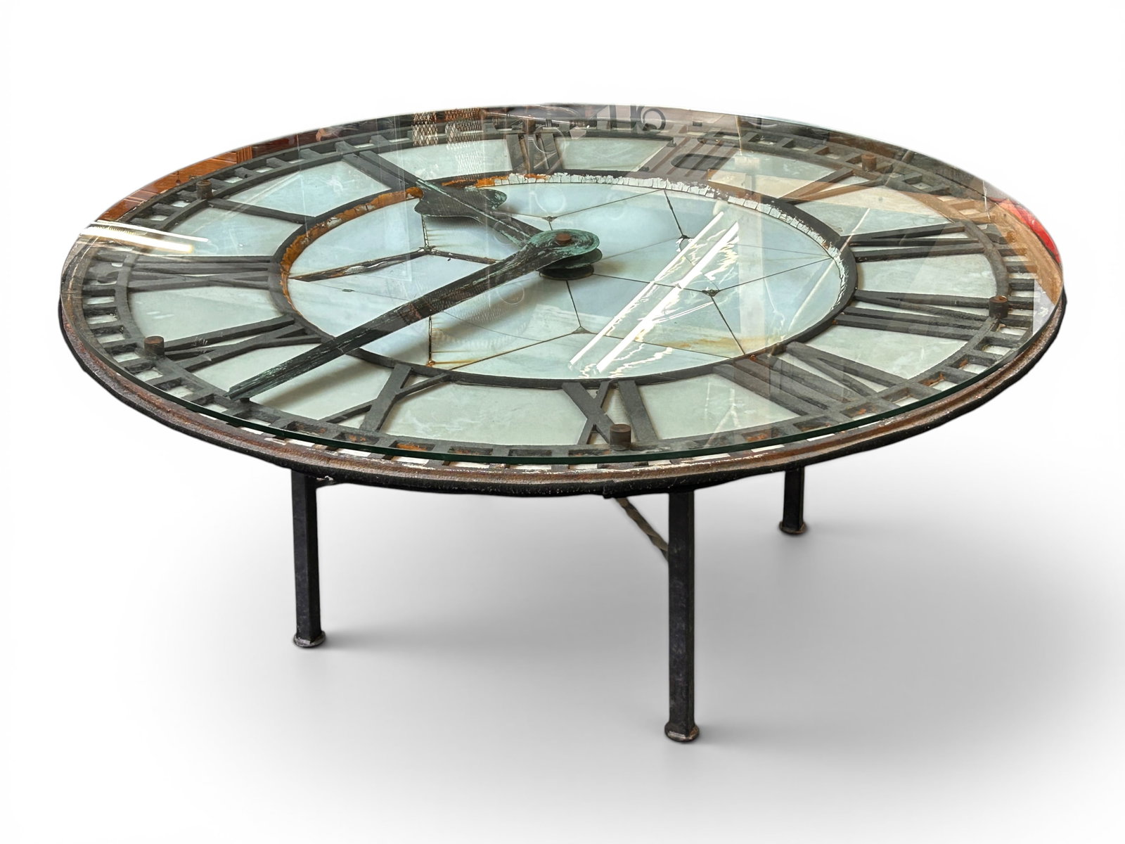 Lg. French Factory Clock Face Round Dining Table.: The large dining table easily fits from 8-10 chairs. The clock face, which is protected by a 1/2" thick glass top, we are told is an original to a European leather factory that made the leather for Me