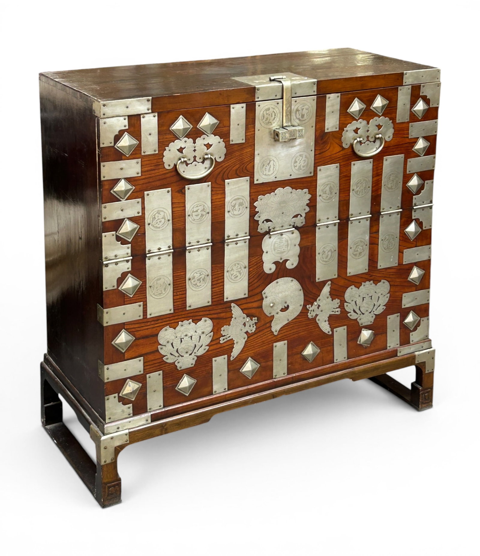 Antique Japanese Tansu Chest.: The wooden chest has antique mortise and tenon joinery, and silver toned metal hardware and decorations. The metal does not attract a magnet. The front top section is hinged so it can drop open from t