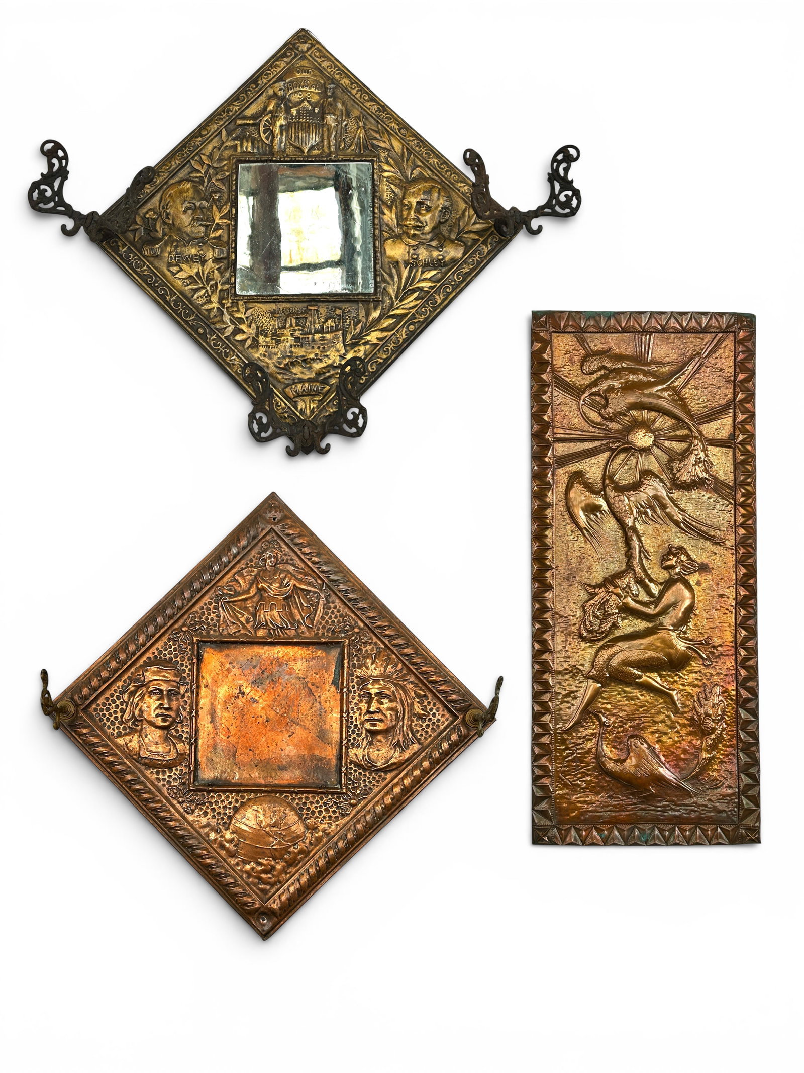 3 Tooled Brass & Copper Figural Plaques inc Mirror: The lot contains 3 tooled metal items. First, there are two square pieces which are likely cast. There is a repousse brass piece featuring portraits of Dewey and Schley, "Our Boys of '98", and a repre