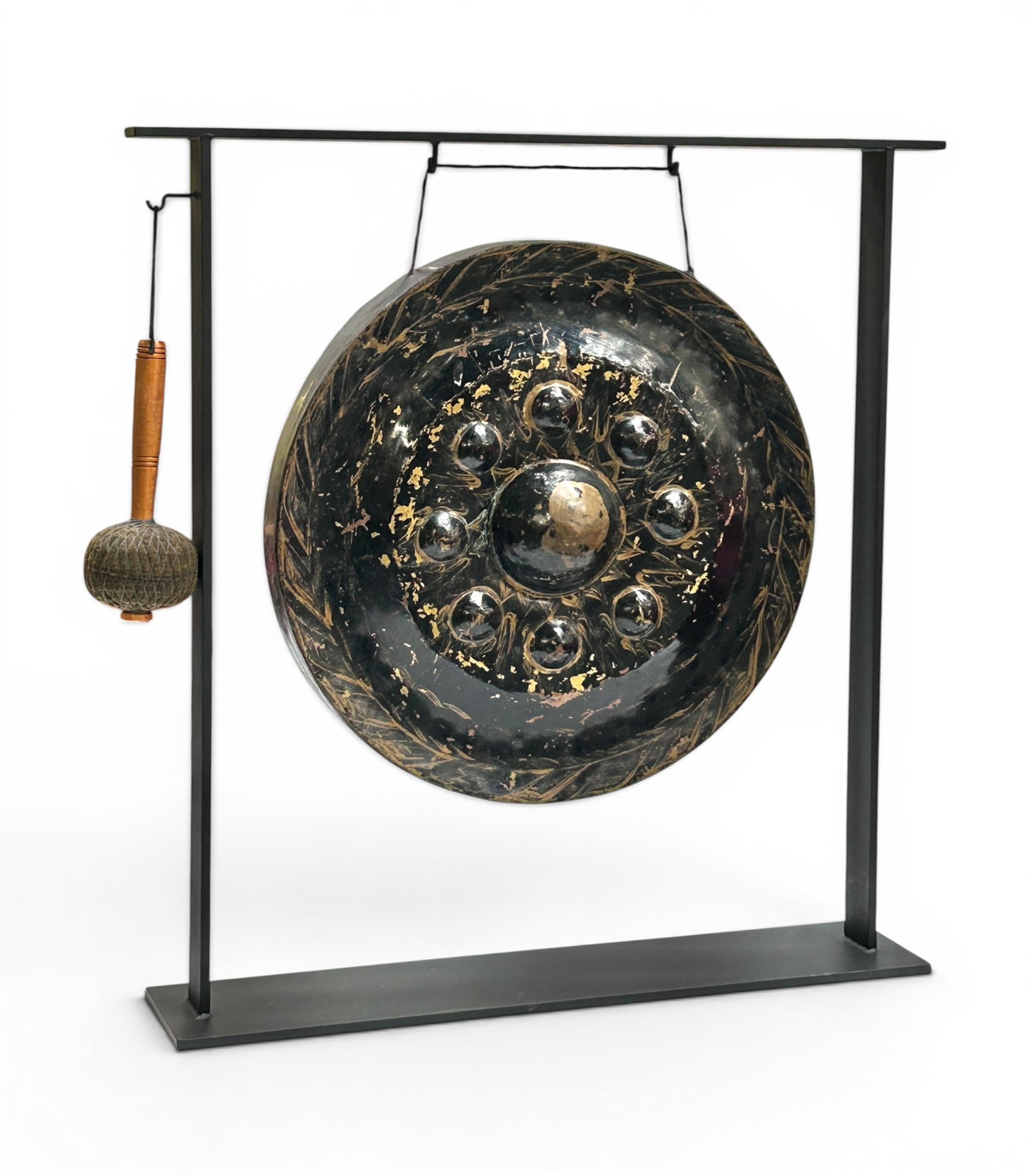 Southeast Asian Bronze Painted Gong on Stand.: This Thai or Burmese gong has hand painted gild strokes on the front. The bronze gong measures 20 3/8" in diameter, and the iron stand measures 31" tall, 28 1/8" wide, and 6" deep. The handmade