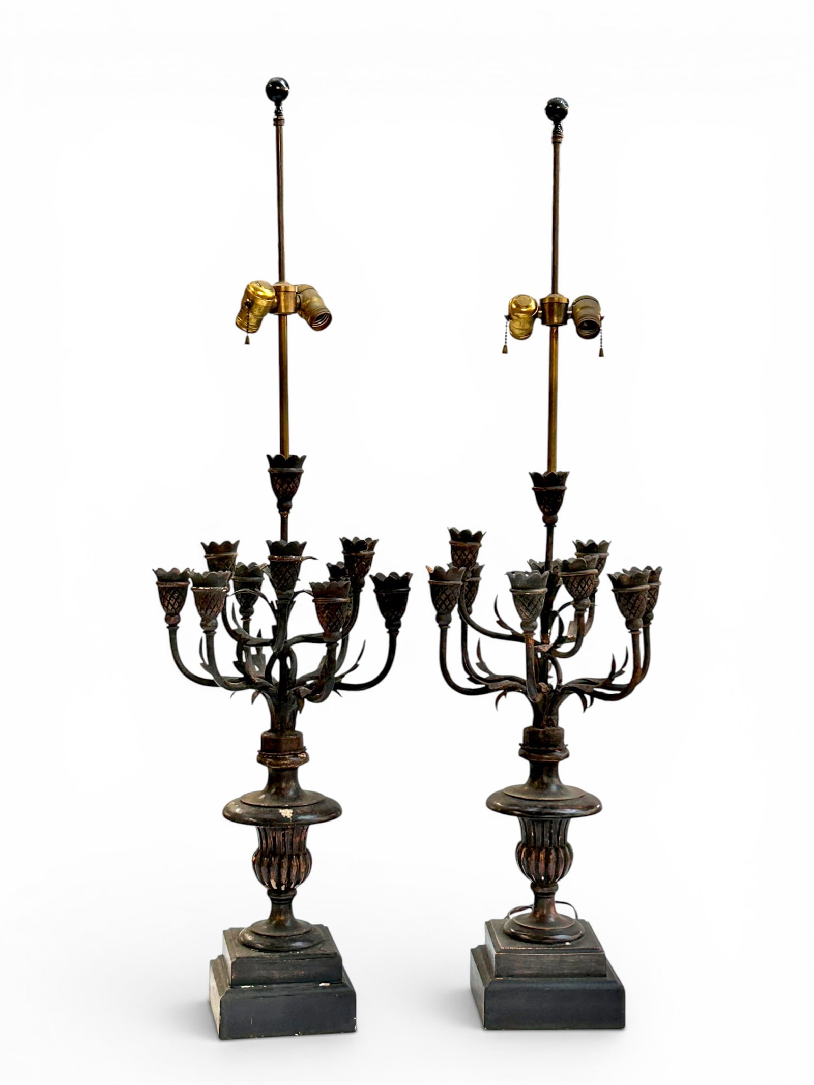 Pr. of Tall French Style Candelabra Table Lamps.: The pair of two-light table lamps have 10 arms with pineapple designed capitols. The arms have iron and other metal parts. The urn style base is composition, painted to look like bronze or iron. The l
