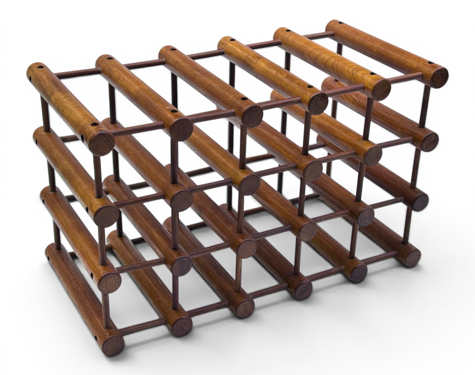 MCM Nissen Langaa Denmark Teak Modular Wine Rack: The wine rack can hold 15 bottles. It can be stand up vertically or horizontally. It is branded Nissen Demark on one of the pegs. It measures 22" tall, 13 1/2" wide, and 11 1/8" deep. There are some s