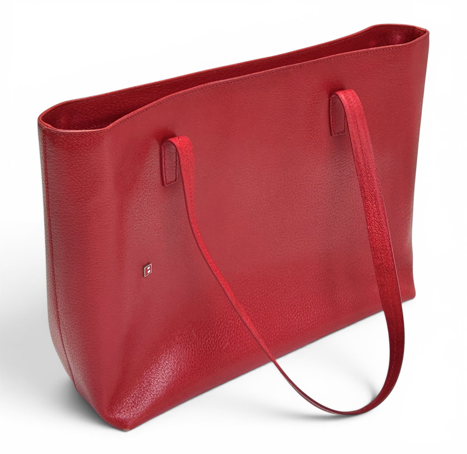 Vintage Bally Red Leather Tote Bag.: The Bally bag is structured and has two large zippered compartments inside, which creates 3 organization spaces around them. It measures 11" tall and 15 1/2" wide. There are some darkened splattered s
