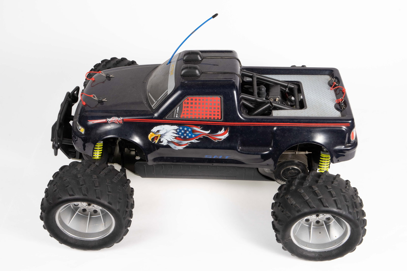 XTM Racing RC Truck w/ 27cc Engine.: There is no remote control included. It could use a light cleaning, but looks to be in overall good condition. It measures 26 1/2" x 20 1/2" x 14". In-house shipping is available. Please see our