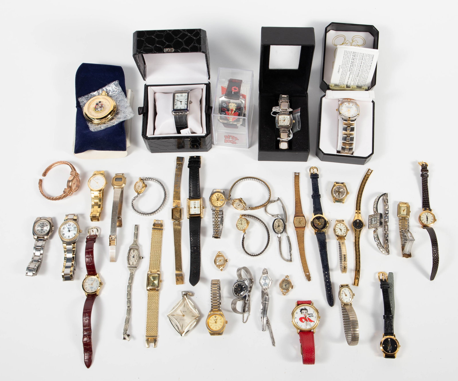 Lot Ladies' Wristwatches - Gucci, Silver, Deco.: The lot contains 35 watches, both vintage and modern. some of the stand out items are an Ecclissi sterling silver and mother of pearl piece in the original box, a round Gucci with red and green