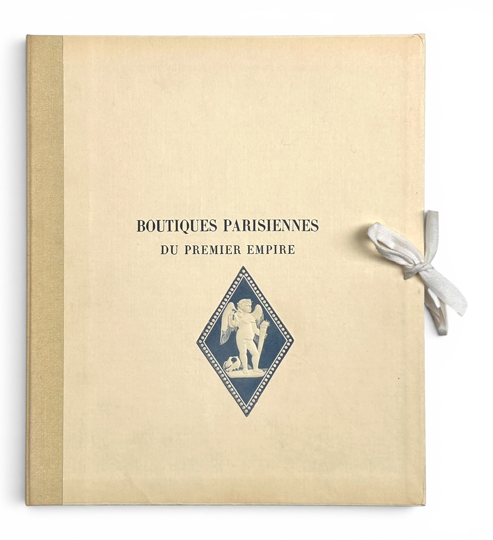 Boutiques Parisiennes Du Premier Empire, Lefuel.: The antique book by Hector Lefuel was published in 1925 by Albert Morance. The hardcover book is unbinded by design. It has a group of text pages and 32 loose color lithographs of a variety of Parisia