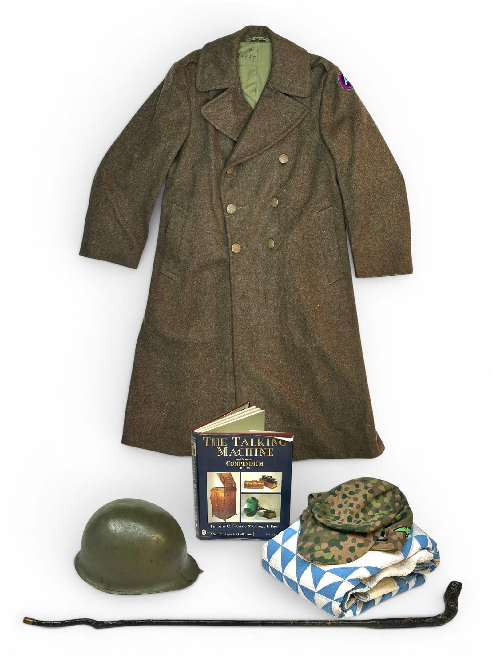 Mostly WWII Army Lot - Coat, Helmet, Cap, Quilt, E: The lot contains 6 items. There is a size 36R green wool coat with a WWII Third Army patch, a metal helmet, a legionnaire cap, a wooden cane marked Ohara, a blue and a white ocean waves patchwork quil