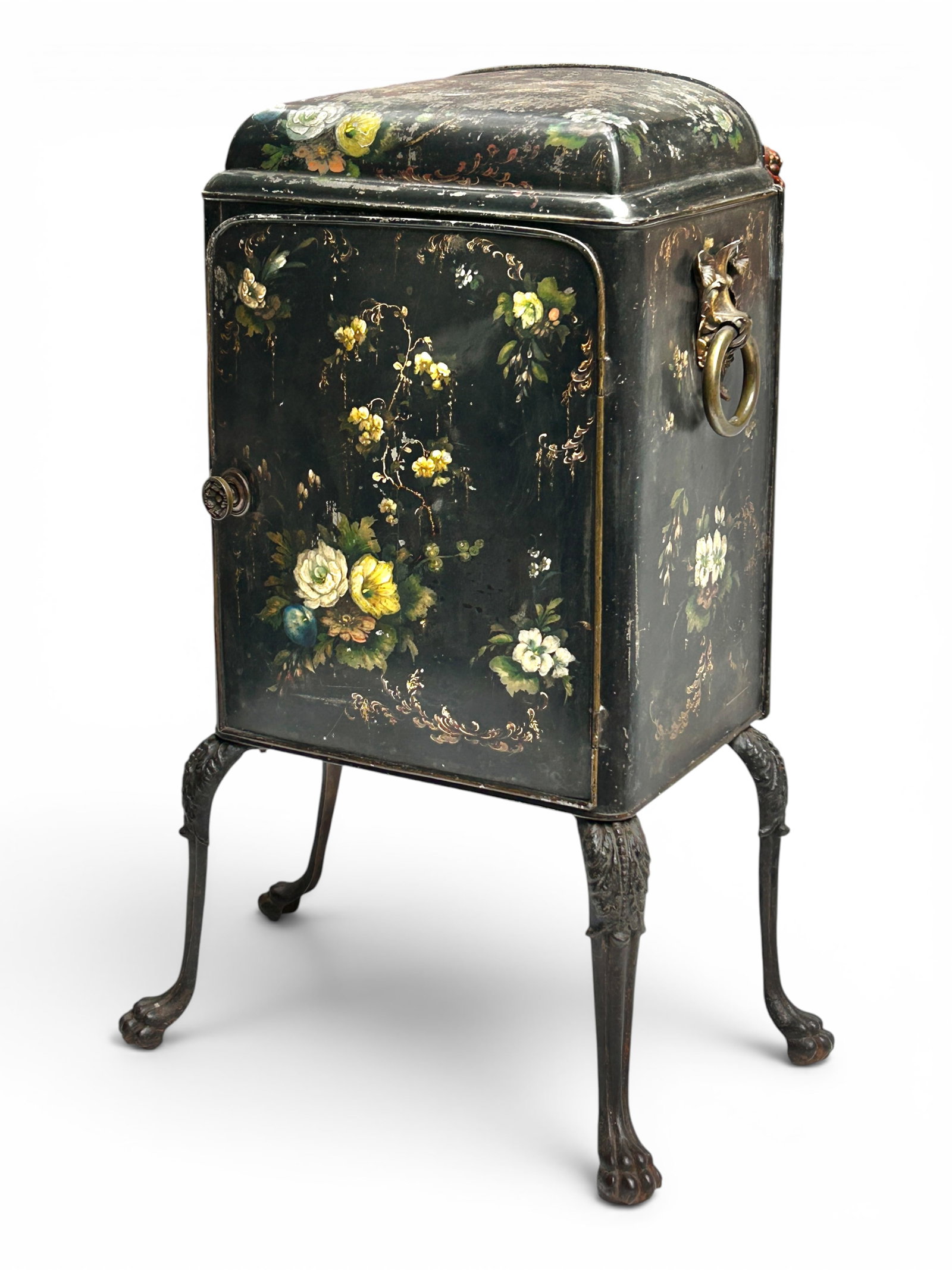 Antique Tole Plate Warmer Cabinet.: The cabinet has floral decorations, an open back, three fixed shelves, cabriole legs with paw feet, and floral decorated carrying handles. There are some scratches and paint loss, but overall, the pie
