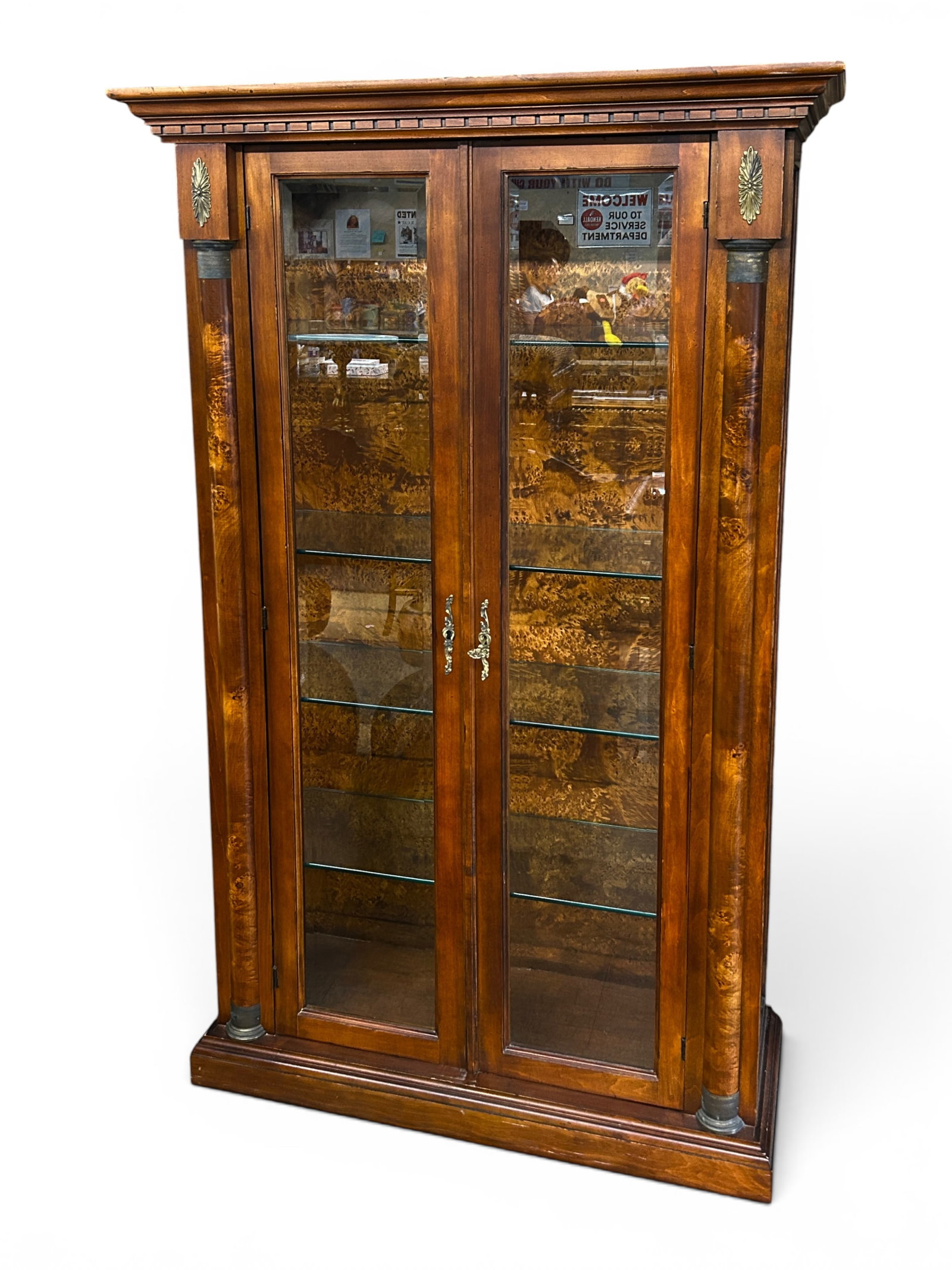 Italian Burled Wood Illuminated Display Cabinet.: The piece is marked Made in Italy on the back, and features bevelled glass on the front and sides. It has two front doors with 4 glass shelves, with a burled wood veneer back and two lights at the top