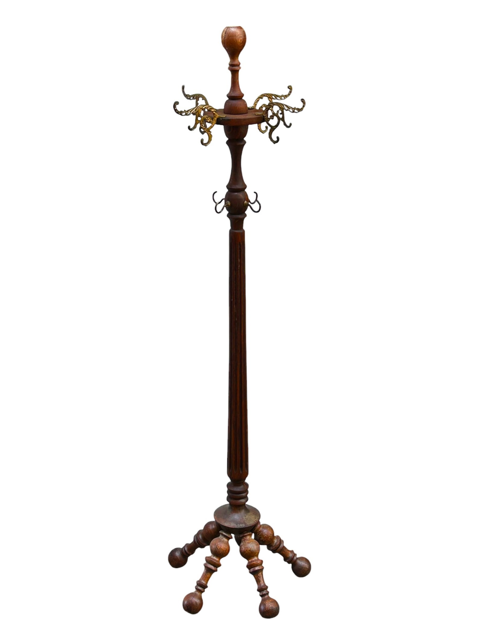 Antique Oak Coat Rack.: This coat rack or hall tree has five stick and ball style feet and ornate metal hooks. There is a repaired crack near the top of the piece (where one of the larger metal hooks connect). Otherwise, it