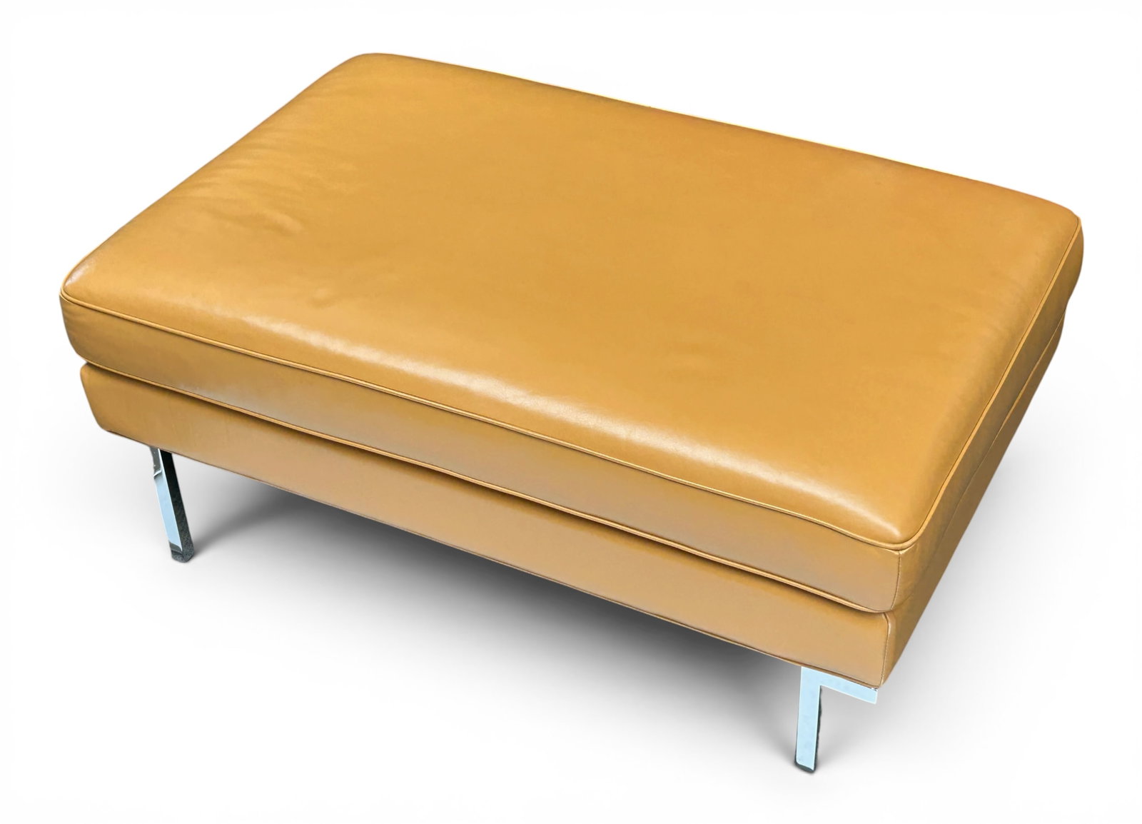 Design Within Reach Theatre Leather Ottoman.: The chair was designed by Ted Boerner. It has the original label on the underside. It features a yellow fine quality leather, welted seams, and polished chrome legs and base. It measures 18 1/2"