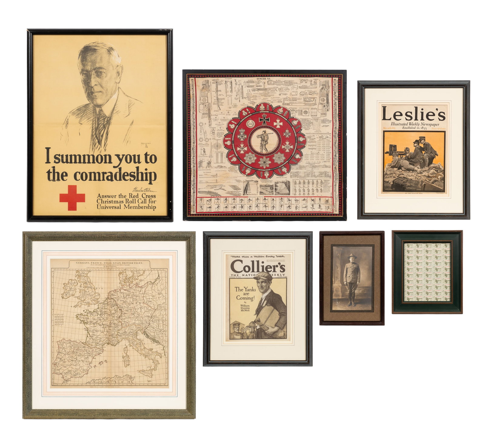 Lot: 7 Pcs. Framed Mostly WWI Ephemera.: The lot contains 7 framed items. Six of them are from the WWI era. There is Leslie's Illustrate Weekly Nov. 18th 1915 newspaper cover, an uncut Veterans World War I USA 22 stamp sheet, a Collier's The