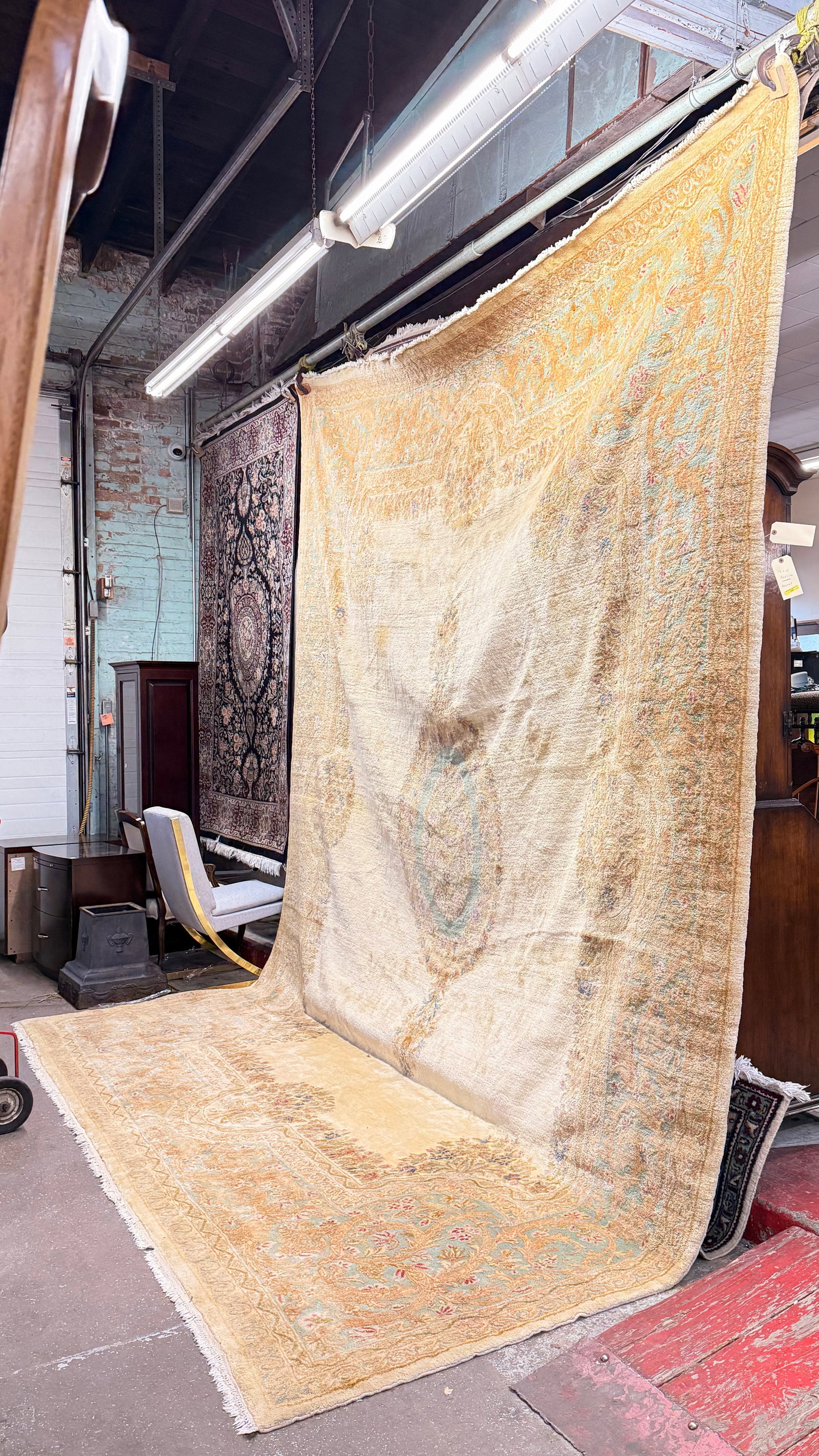 12' x 15' Palace Size Persian Kerman Rug.: The rug looks to be in good overall condition. In-House Shipping is available for this rug. Please see our website for our in-house shipping procedures.
