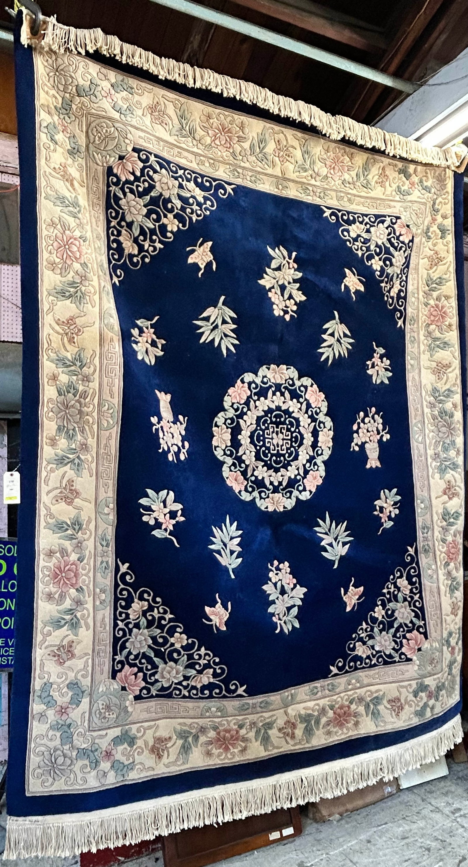 8' x 10' Blue Sculptured Chinese Rug.: The rug looks to be in good overall condition. In-House Shipping is available for this rug. Please see our website for our in-house shipping procedures.