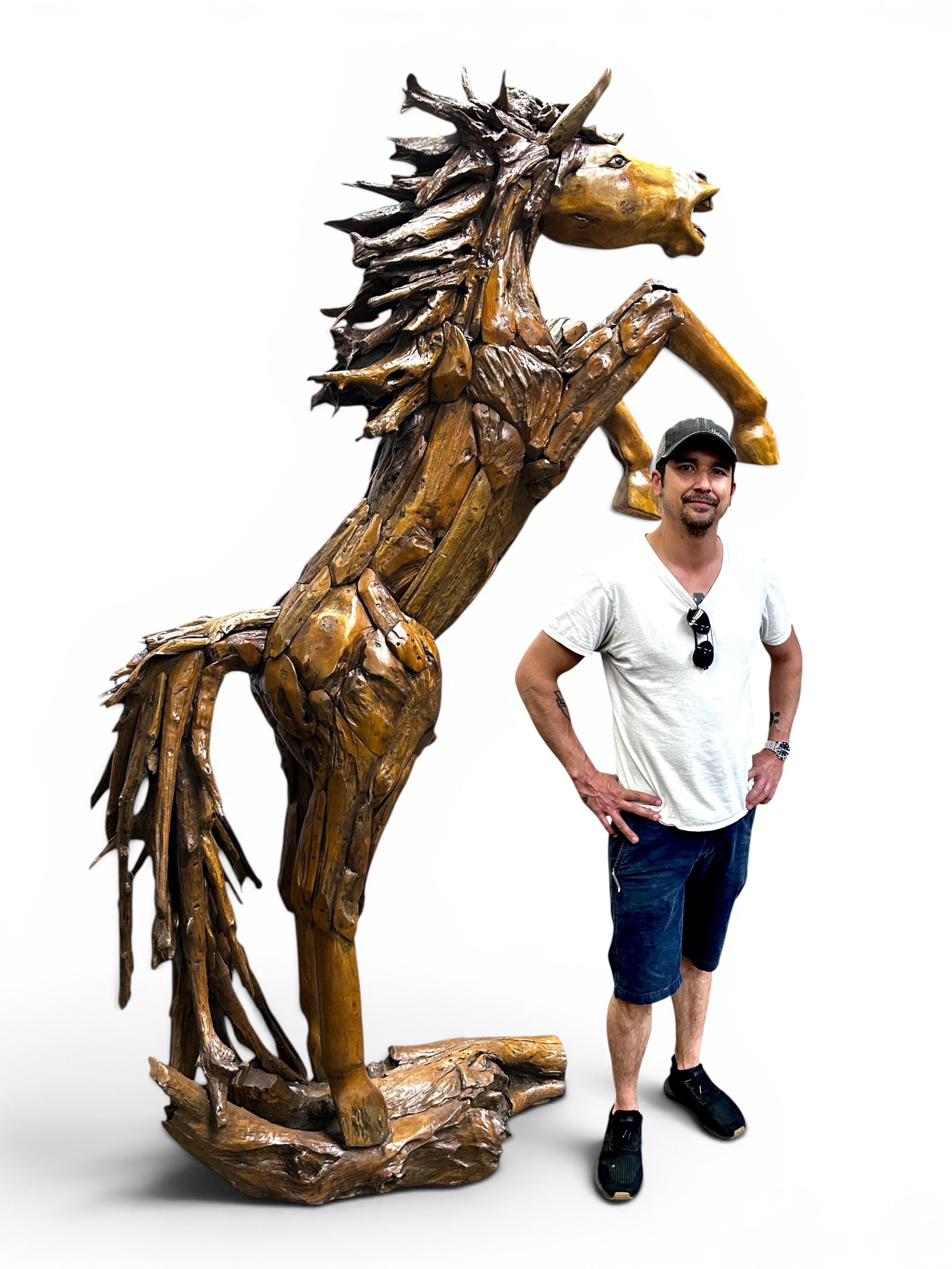 Life-Sized Teakwood Rearing Horse Sculpture.: The sculpture is composed of reclaimed and carved teakwood. It measures 93" tall, 58" wide, and 19" deep. There are some scratches and scuffs on the piece. Otherwise, it is in overall good condition. 