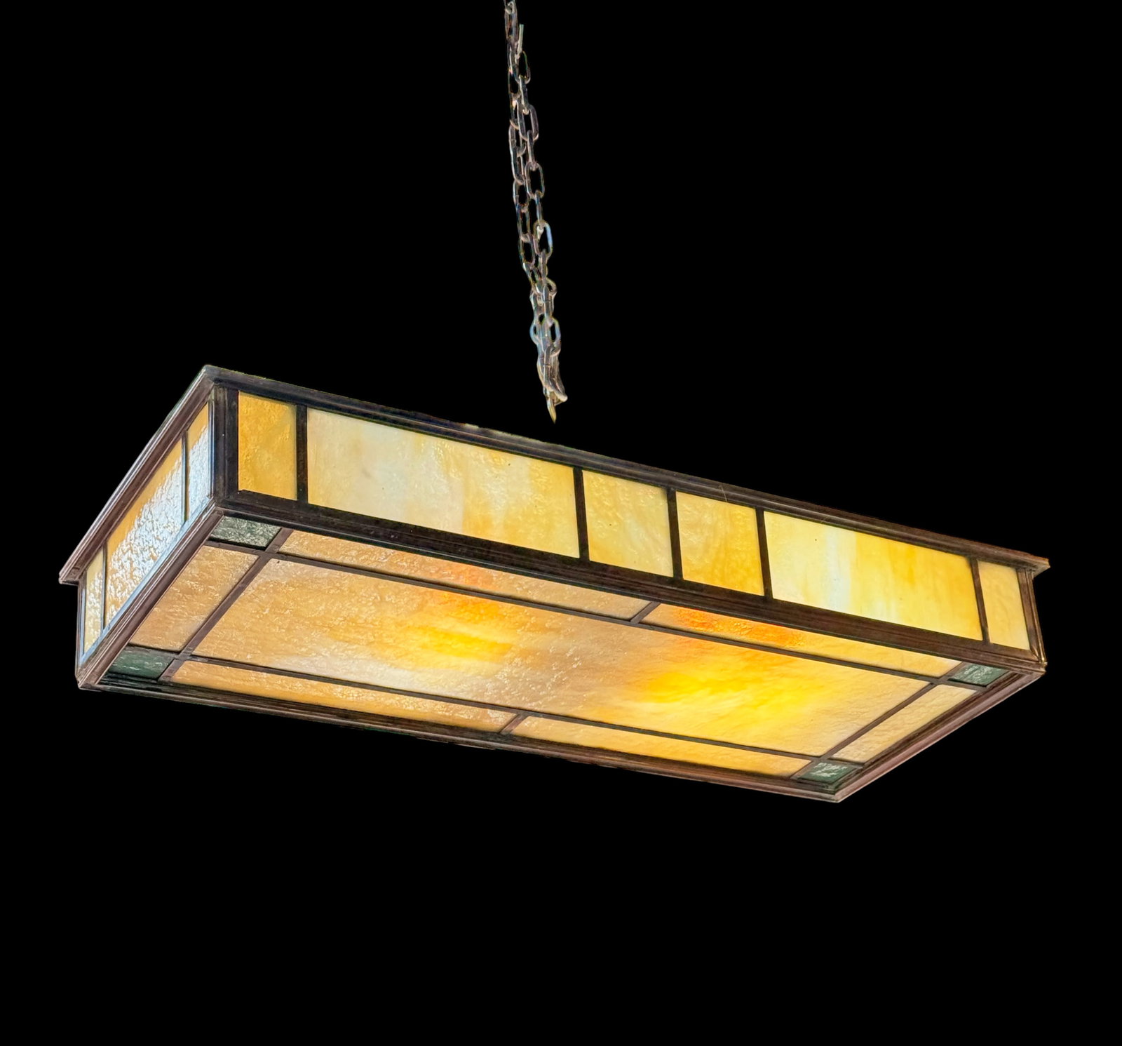 Rectangular Metal Slag Glass Ceiling Light: The 4-light chandelier or pendant light has a rectangular design perfect for dining rooms or billards tables or library tables. It has a metal structure which was painted black to resemble cast iron.
