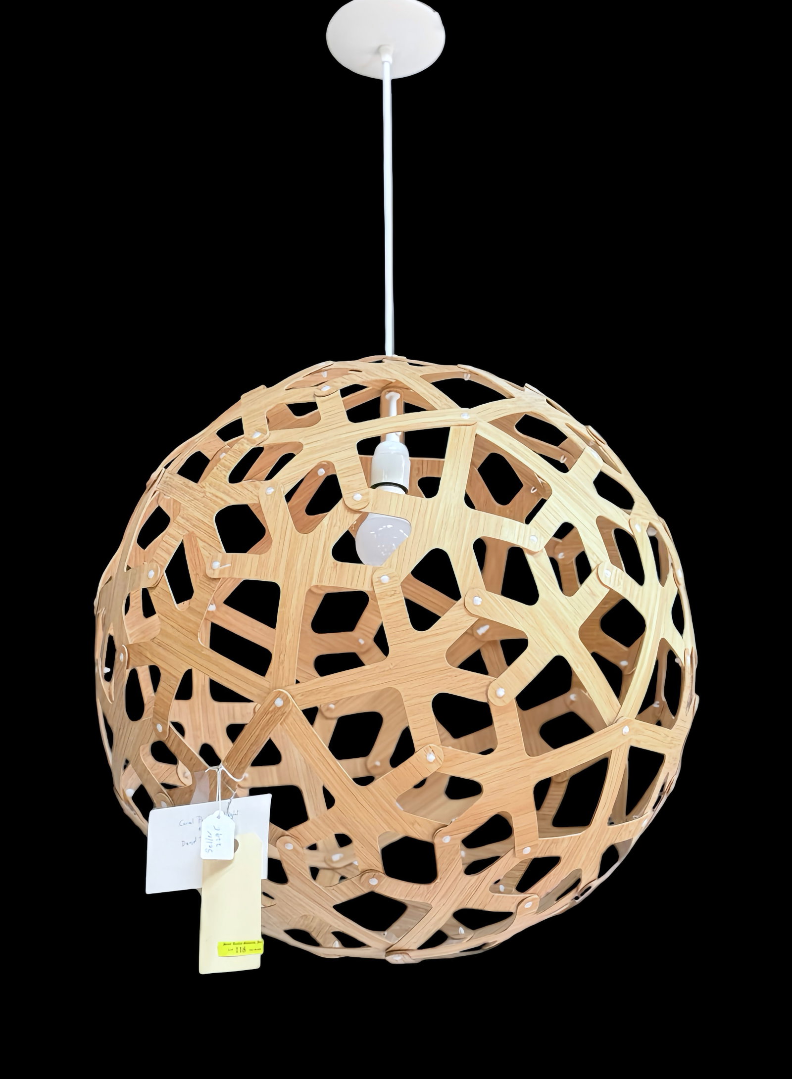 David Trubridge Bamboo Pendant Light, "Coral".: The 1-light pierced pendant light is composed of abstract thin bamboo cuts joined together by white plastic studs. It measures 24" in diameter (not including the ceiling mount). The piece comes with a