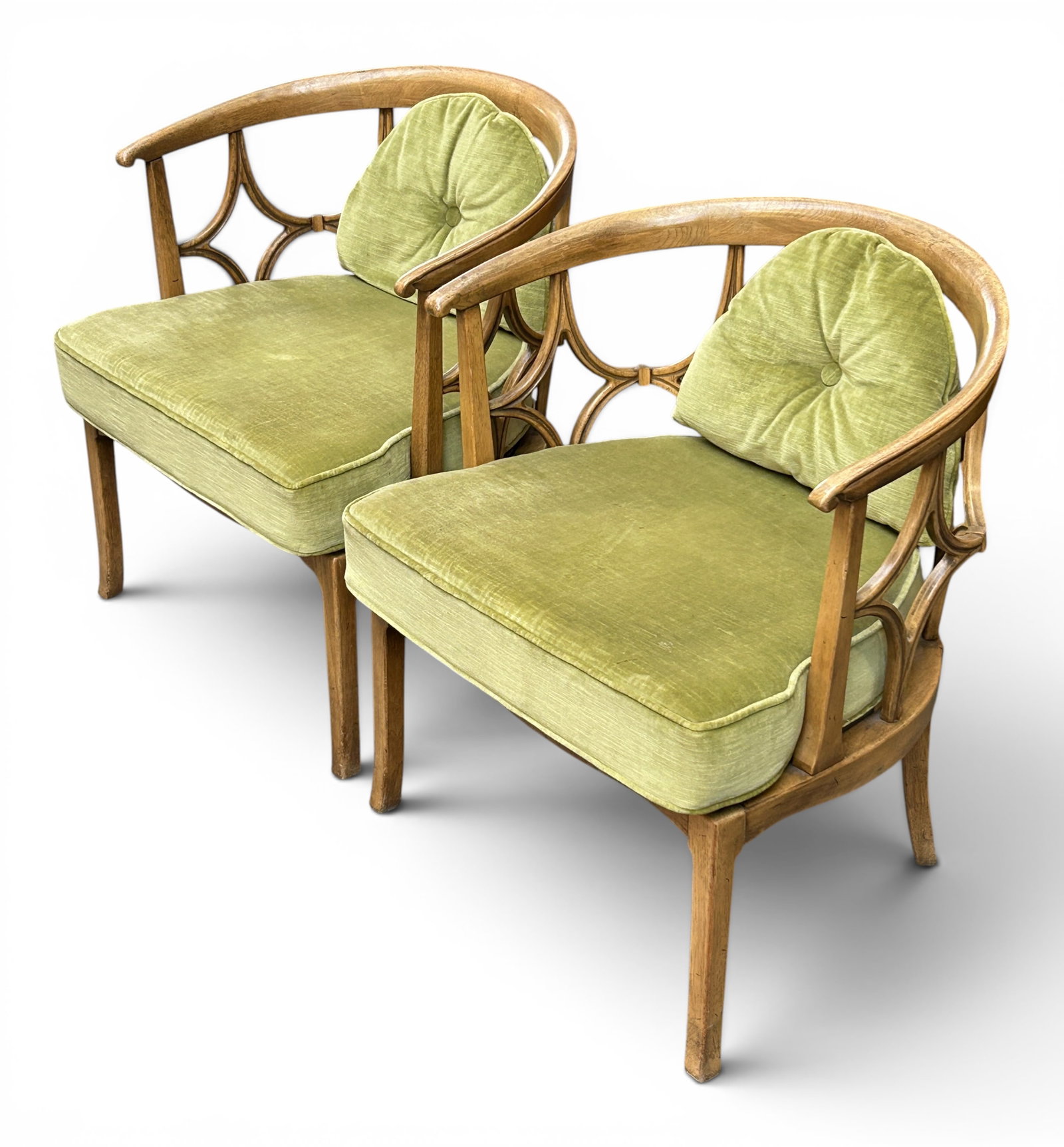 Pair of Billy Haines Hollywood Regency Chairs.: These 1960's barrel back lounge chairs are designed by Billy Haines. They have a spider web or loop designs, beechwood frames, green velvet cushions, and leather strap seats. There is some minor wear,