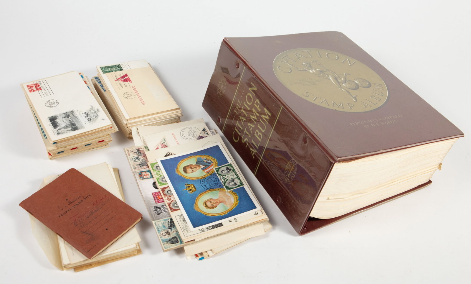 Lot of Stamps - Envelopes & Partial Citation Album: The lot contains mostly U.S. stamps. There are over 100 envelopes, including First Day of Issue and First Day Covers. They are from the 1930s-1960s, and one envelope is stamped 1923. Some of the