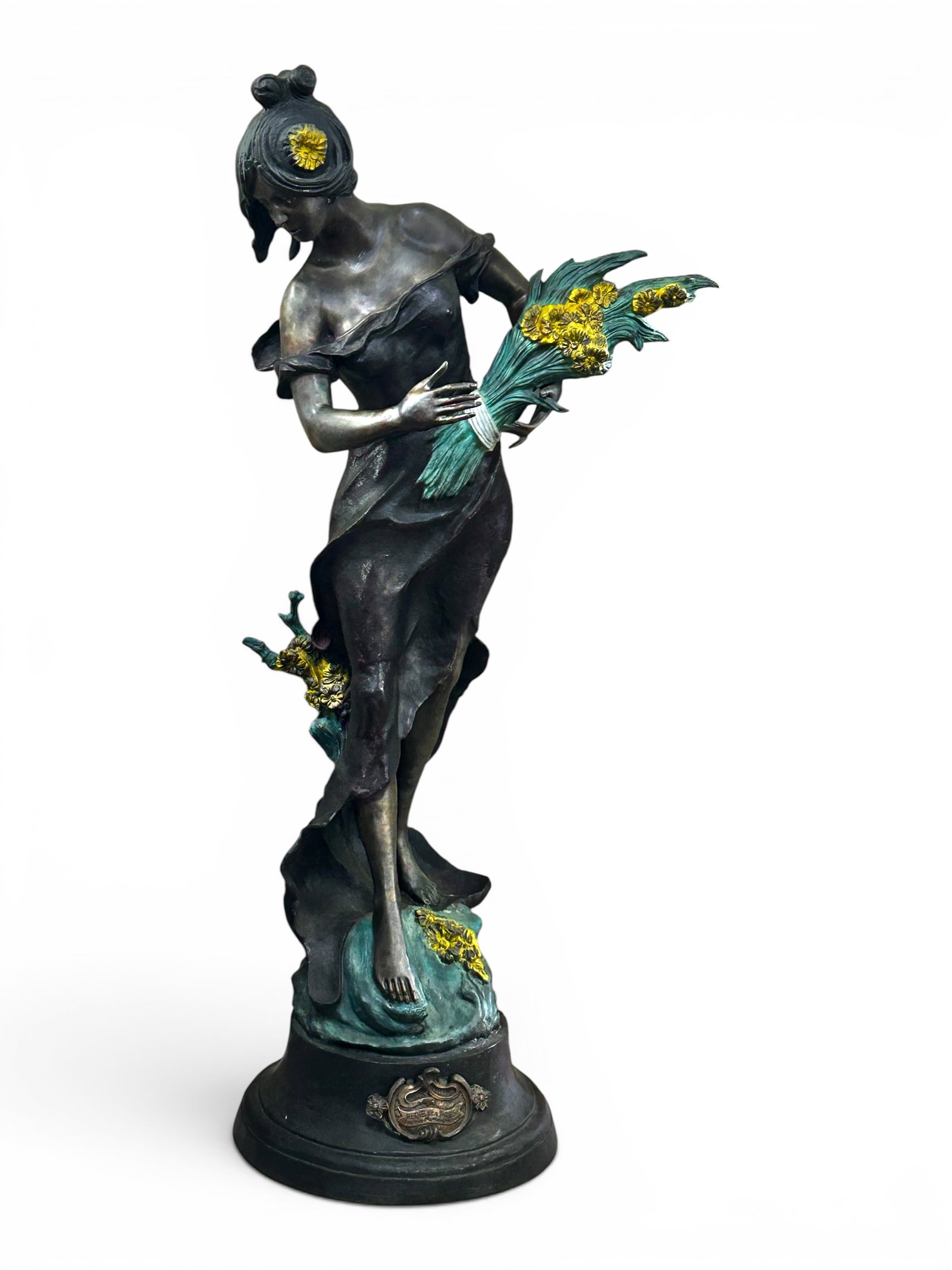 Life-Size Bronze Figural Sculpture Aft. Moreau.: The life-sized Art Nouveau style statue is after the Auguste Moreau sculpture "Reine Des Pres", which depicts a draped woman holding a flower bouquet. The base of the sculpture has a plaque labeled