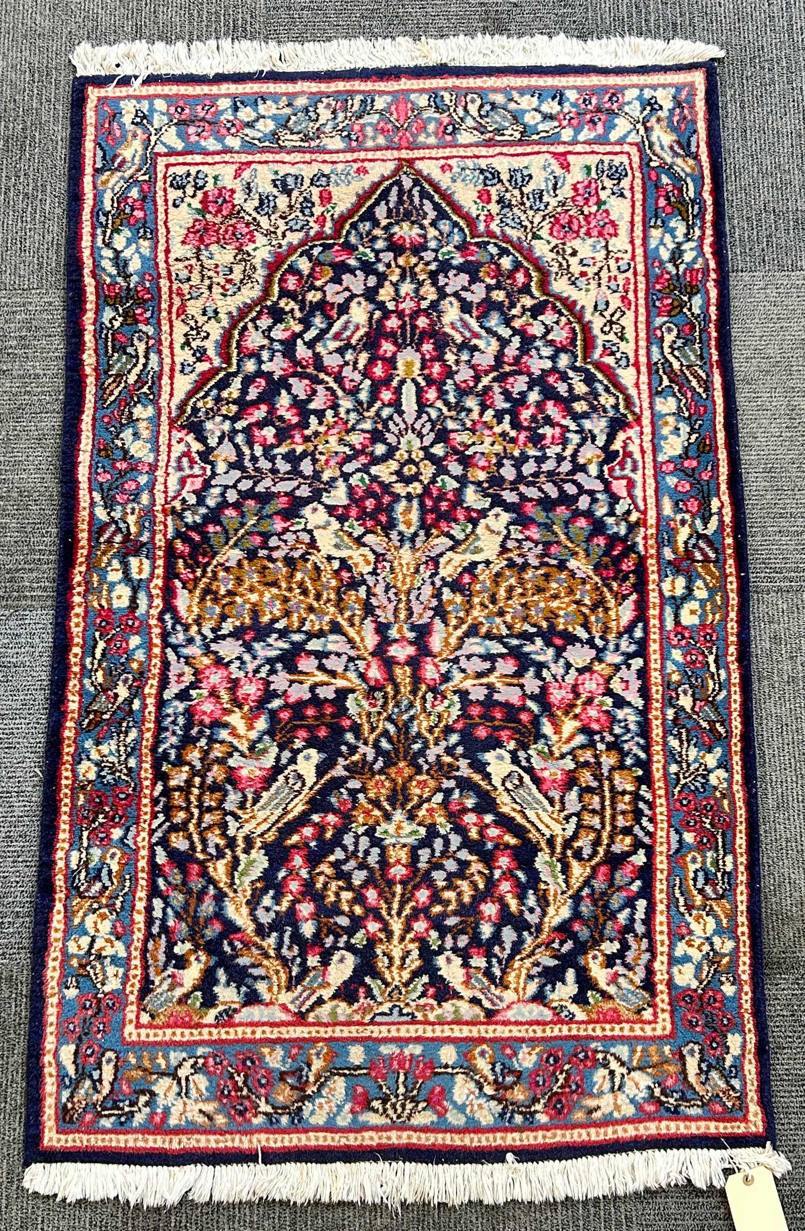 3' x 4' 11" Kirman Navy Prayer Rug.: The rug looks to be in good overall condition. In-House Shipping is available for this rug. Please see our website for our in-house shipping procedures.