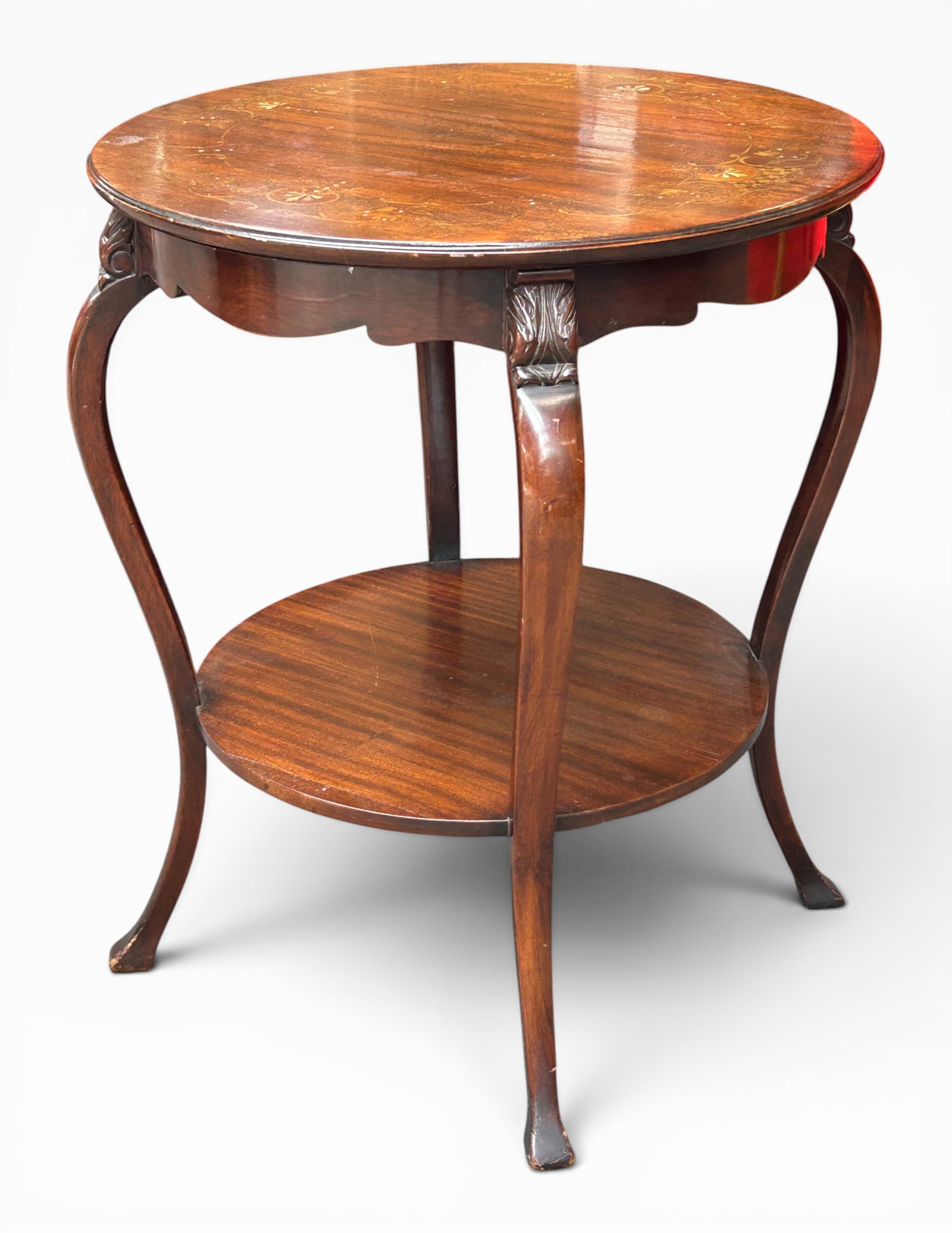 Antique Inlaid Mahogany Parlor Table.: This fine parlor or lamp table has a circular top with marquetry details and a lower tier or shelf. It sits on four carved legs. There are some scratches and indentations. It measures 28" tall, with