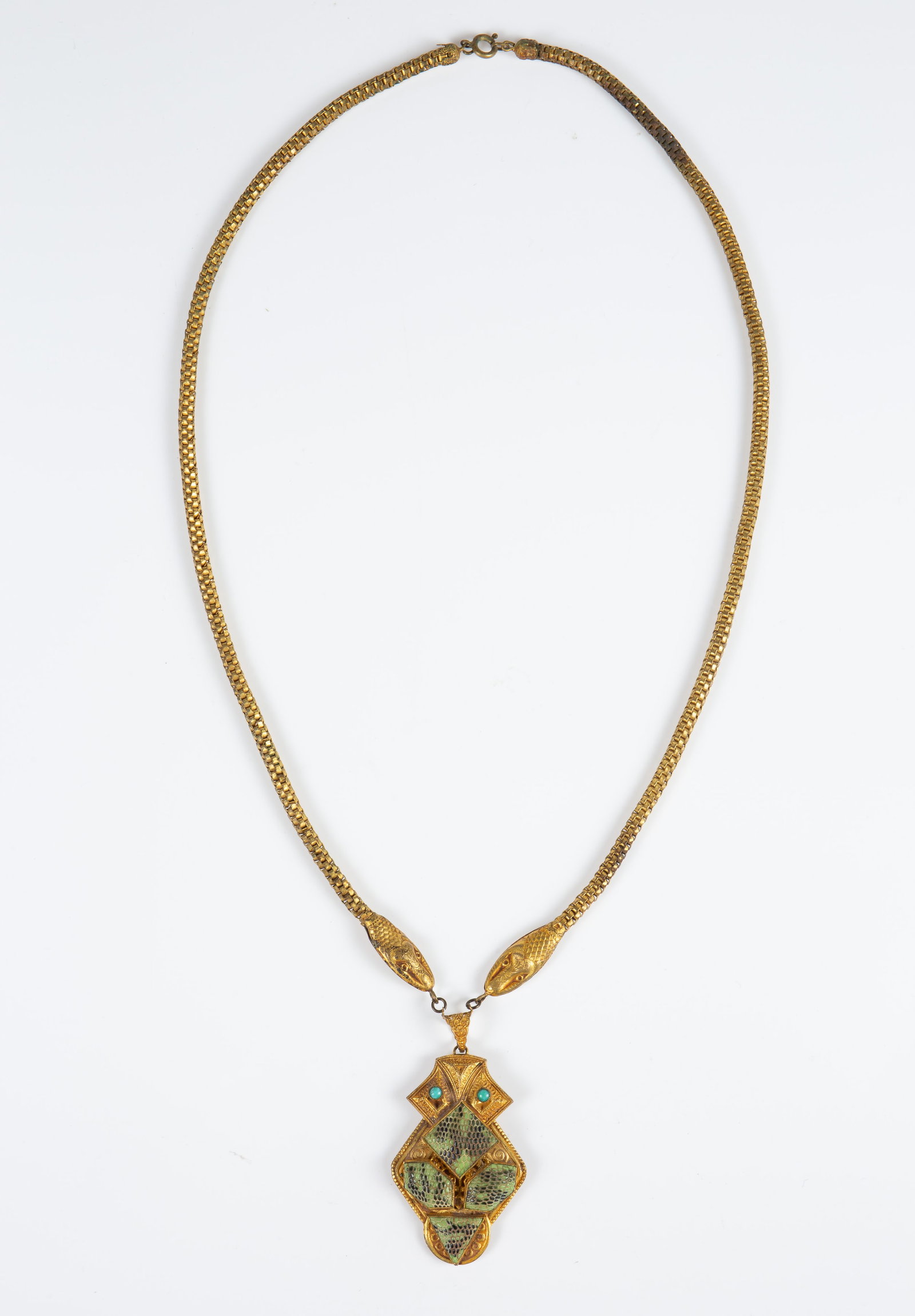 Neiger Brothers Egyptian Revival Snake Necklace.: The antique necklace, which is marked Czechoslovakia on the back of the pendant, is attributed to the Neiger Brothers, circa 1920's. The chain ends in two snake heads, which hold the pendant. Then