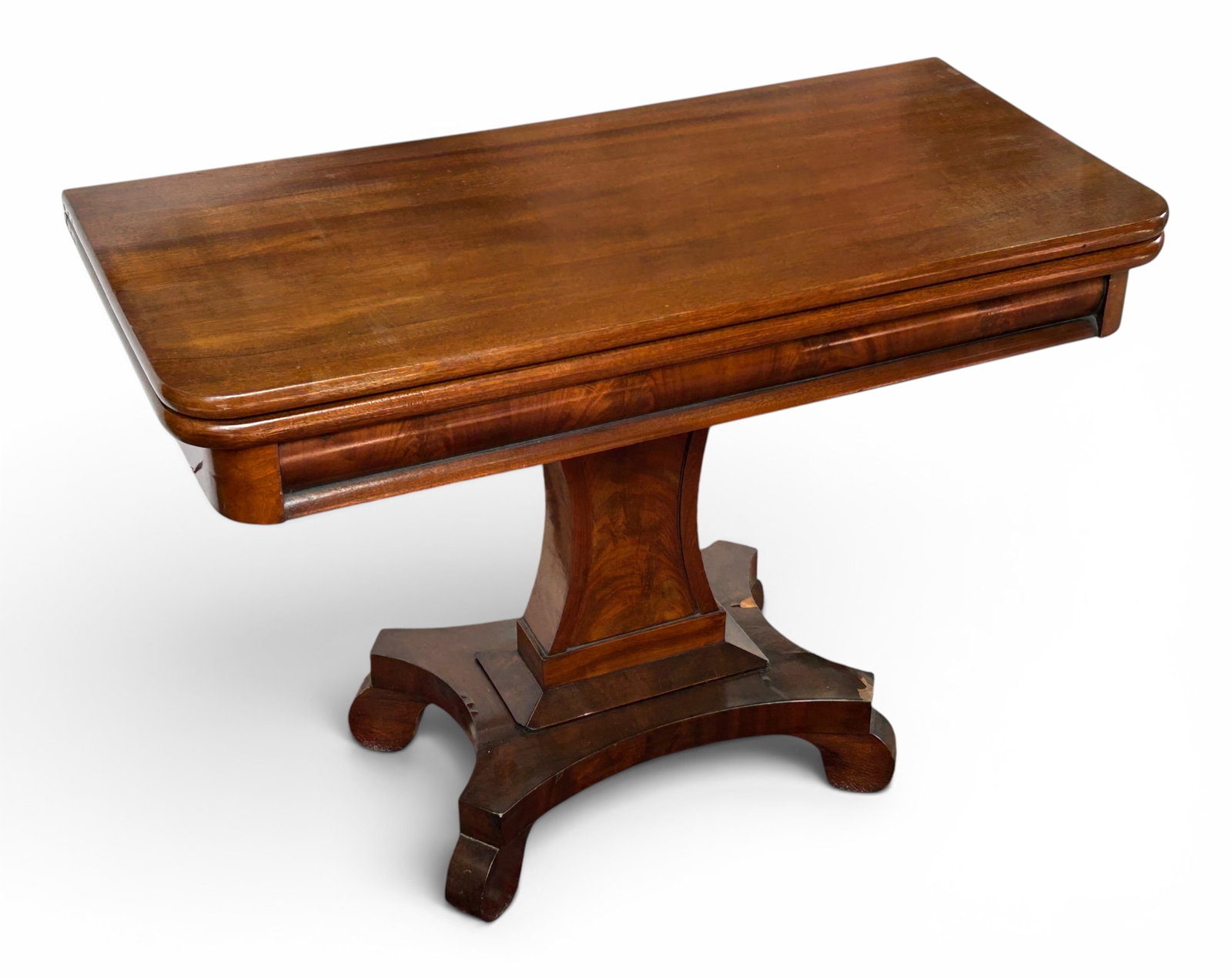 Empire Carved Flip Top Table w/ Pedestal Base.: The American Empire table has a 4-leg pedestal base and a wide carved apron. The top flips open to create a square top, which rotates to be placed at the center of the base. The piece measures 30"