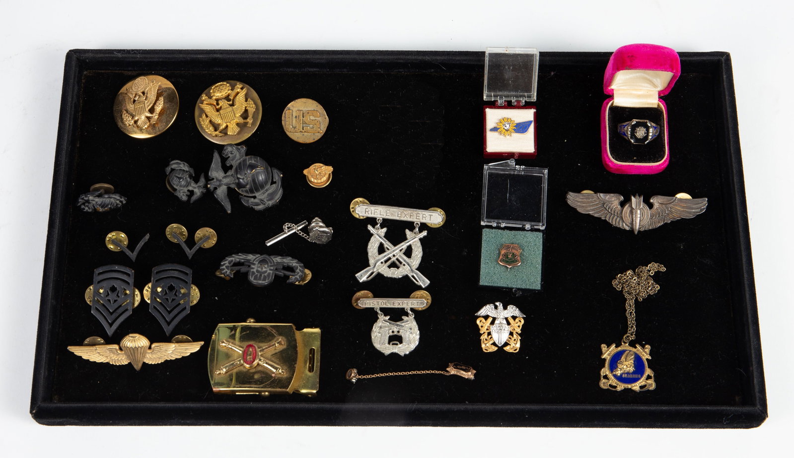 Lot Mostly Military Pins - WWII, Sterling, 18K Top: The lot contains 25 items. A few pieces have precious metals, mostly sterling silver. There is a signet ring with an onyx stone and 18K top, a WWII Seabees Navy sweetheart sterling pendant necklace, a