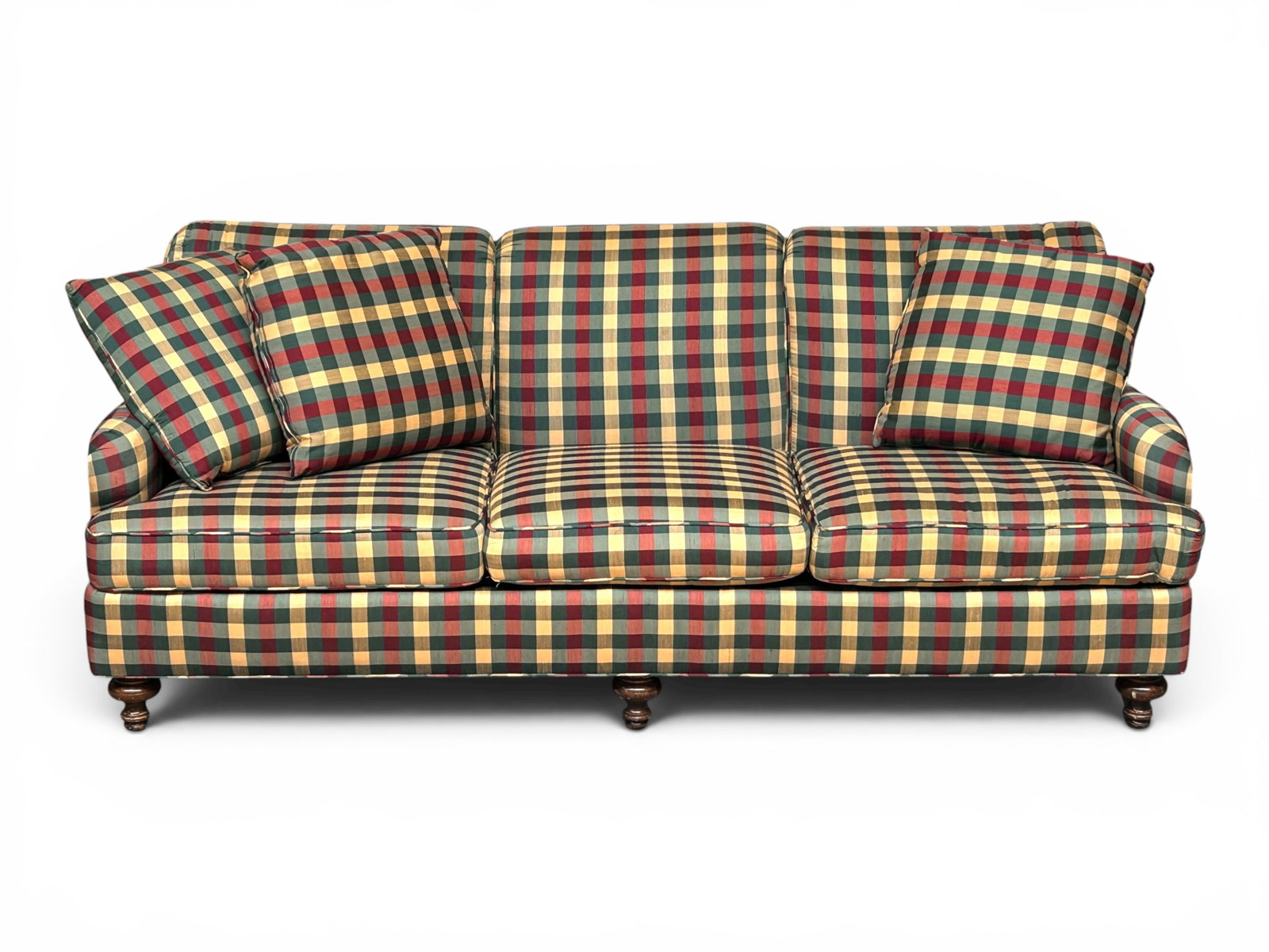 Vintage 3-Seat Plaid Upholstered Sofa.: The sofa has turned wood legs, removable seat cushions, 3 throw pillows, and red, green, and gold plaid upholstery. It measures 35" tall, 86" wide, and 38 1/2" deep. There are some stains on the