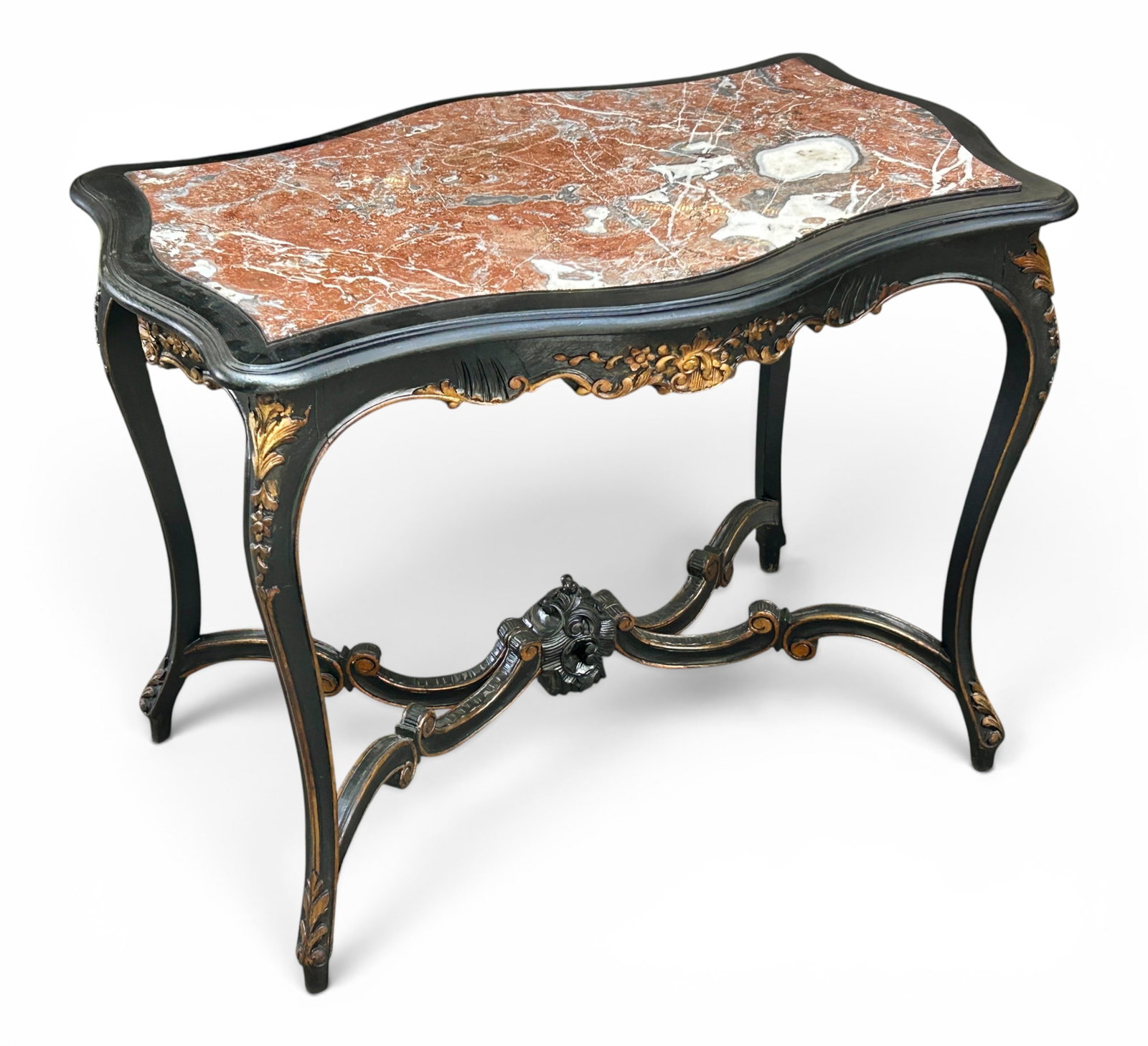 19th C. French Louis XV Carved Gilt Marble Table.: The antique table has a carved and gilded apron, legs, and stretchers joining at a central carved section. The raised flowers, scrolls, and other decorations are gilded. The top has an inlaid veined