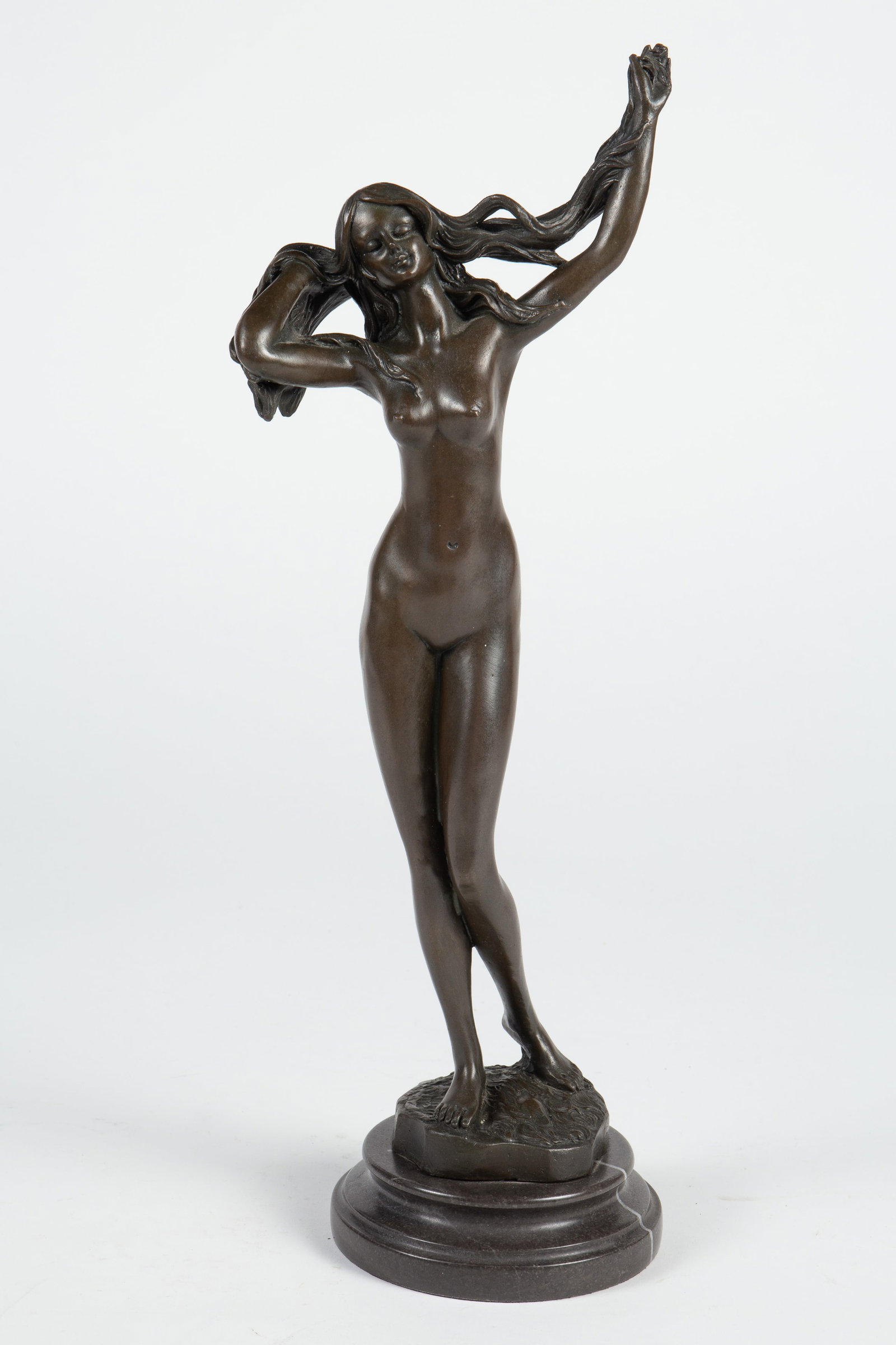 After Jean Patou Nude Female Bronze Stauette.: She is a long-haired woman, attached to a marble base. Overall, the statue looks to be in good condition. The dimensions are 5 1/8" x 4 3/8" x 15 1/8". In-house shipping is available. Please see our